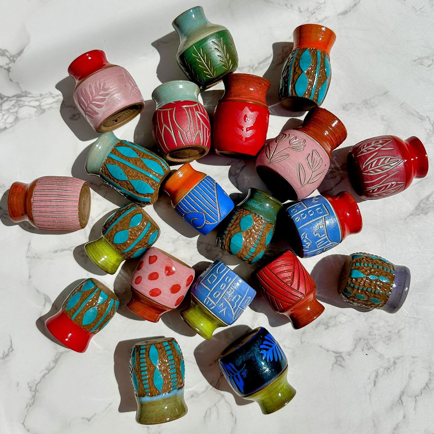 Itty bitty colorful wheel-thrown and hand-carved vases! Aren&rsquo;t they just adorable? Can I part with them? Can I??? 🤪 

Get them first next weekend at Melrose Arts Festival! Want one shipped to you? DM me! $20 + shipping. 

#pottery #tinypottery