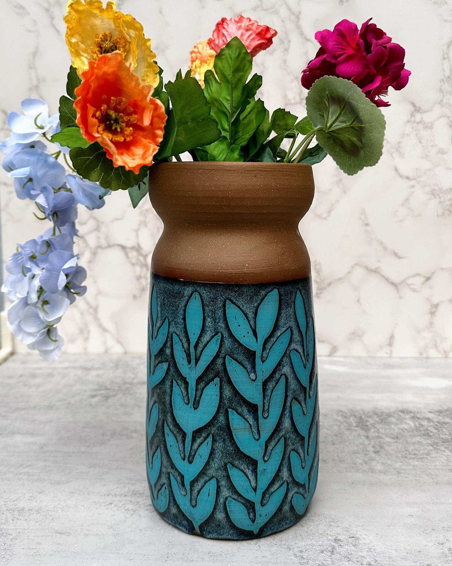 Vase Cintr&eacute; #4. Large vase in Aqua, Blue Rutile, and Bright Yellow. 

This tall bright one (and the cup I made to test this design) found their home this past weekend. I know they will be cherished! 

#pottery #ceramics #handmade #aqua #bright