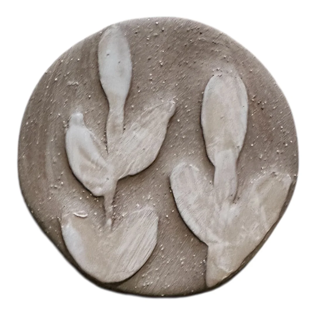 water etched leaves on clay
