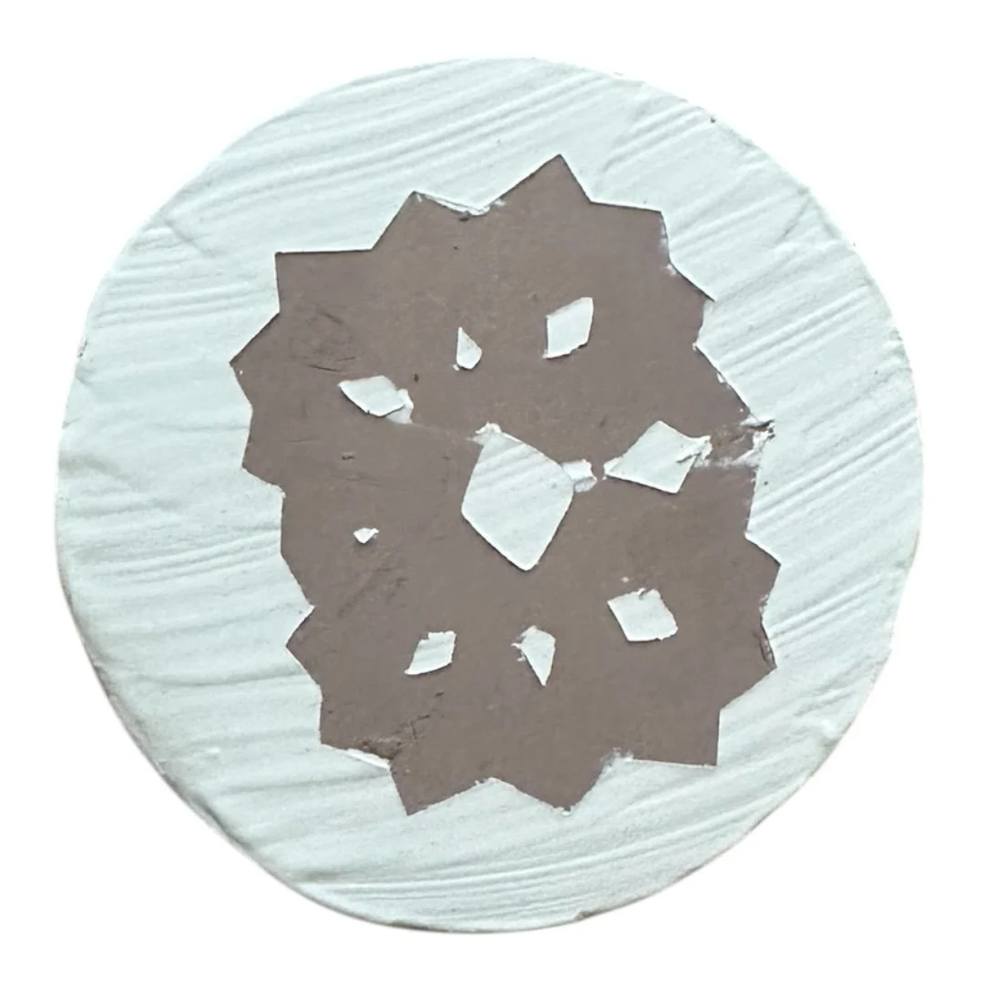 paper resist with slip on clay