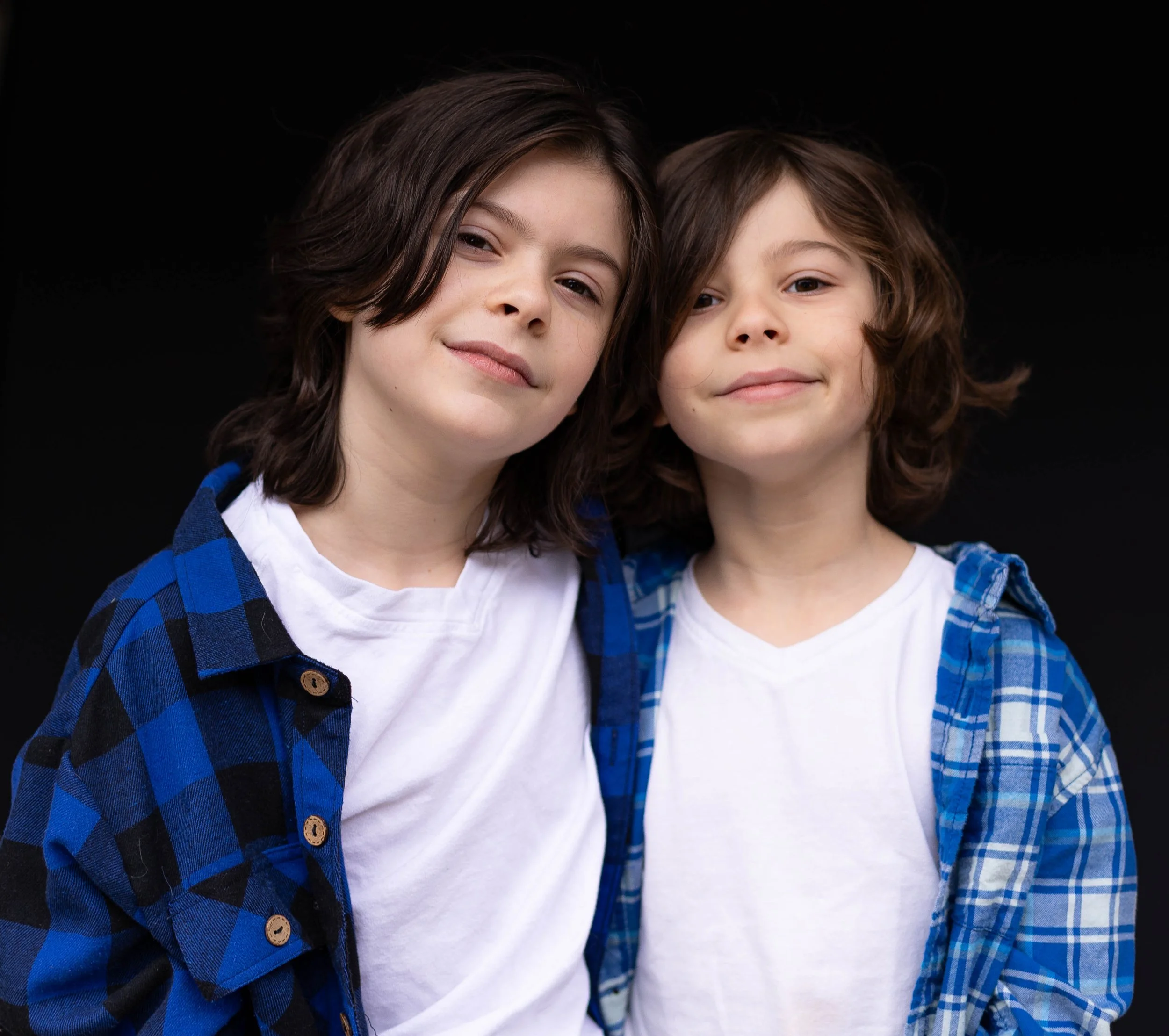 siblings pose together for school picture day.