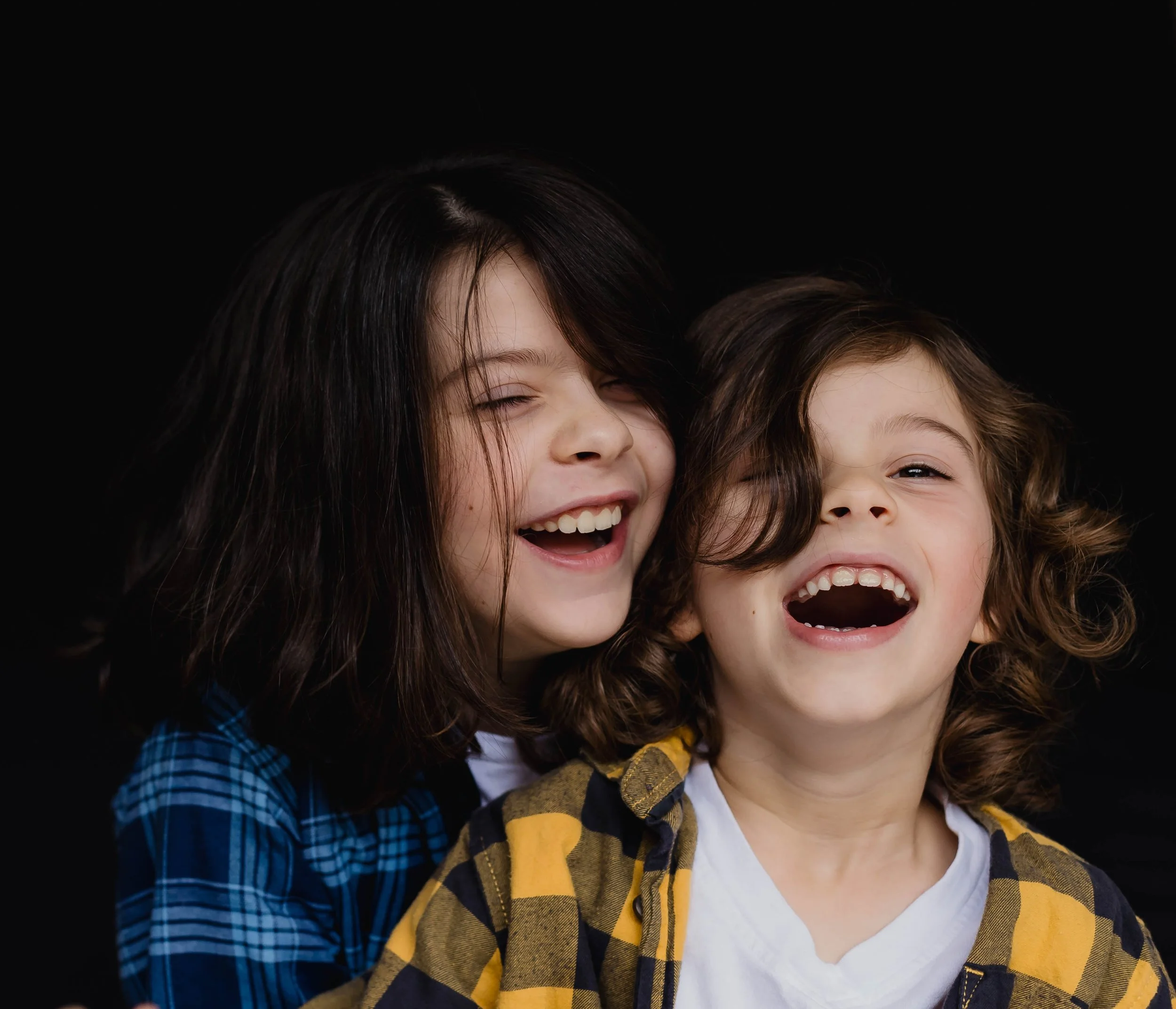 natural smiles for brothers during school picture day.