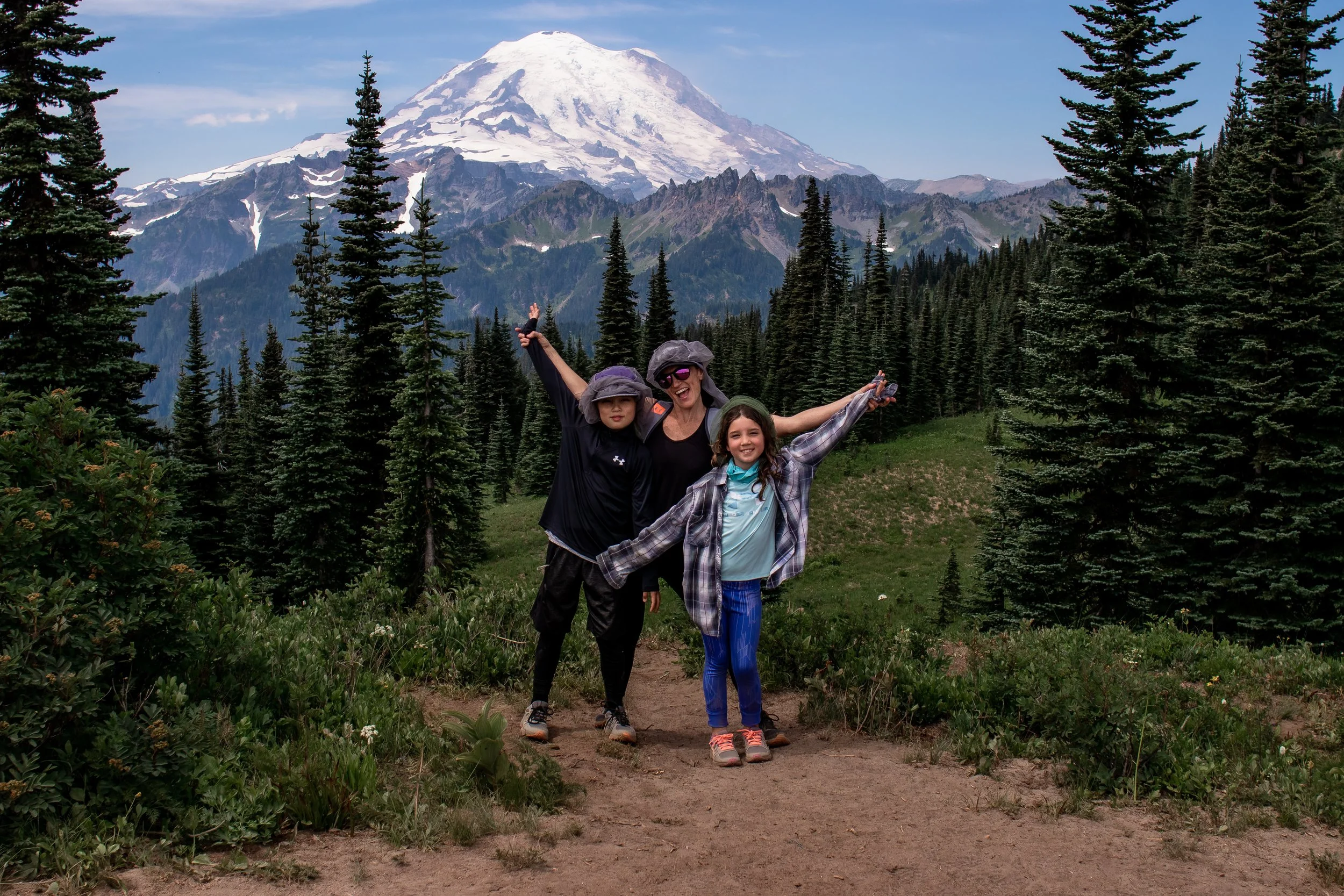 mount rainier. olympia photographer. family adventures. mom and kids hike. pnw adventures. tumwater washington. thurston county. lacey lifestyle photographer. senior photographer. maternity. summer photo shoot. wildflowers and trees. mountain range.