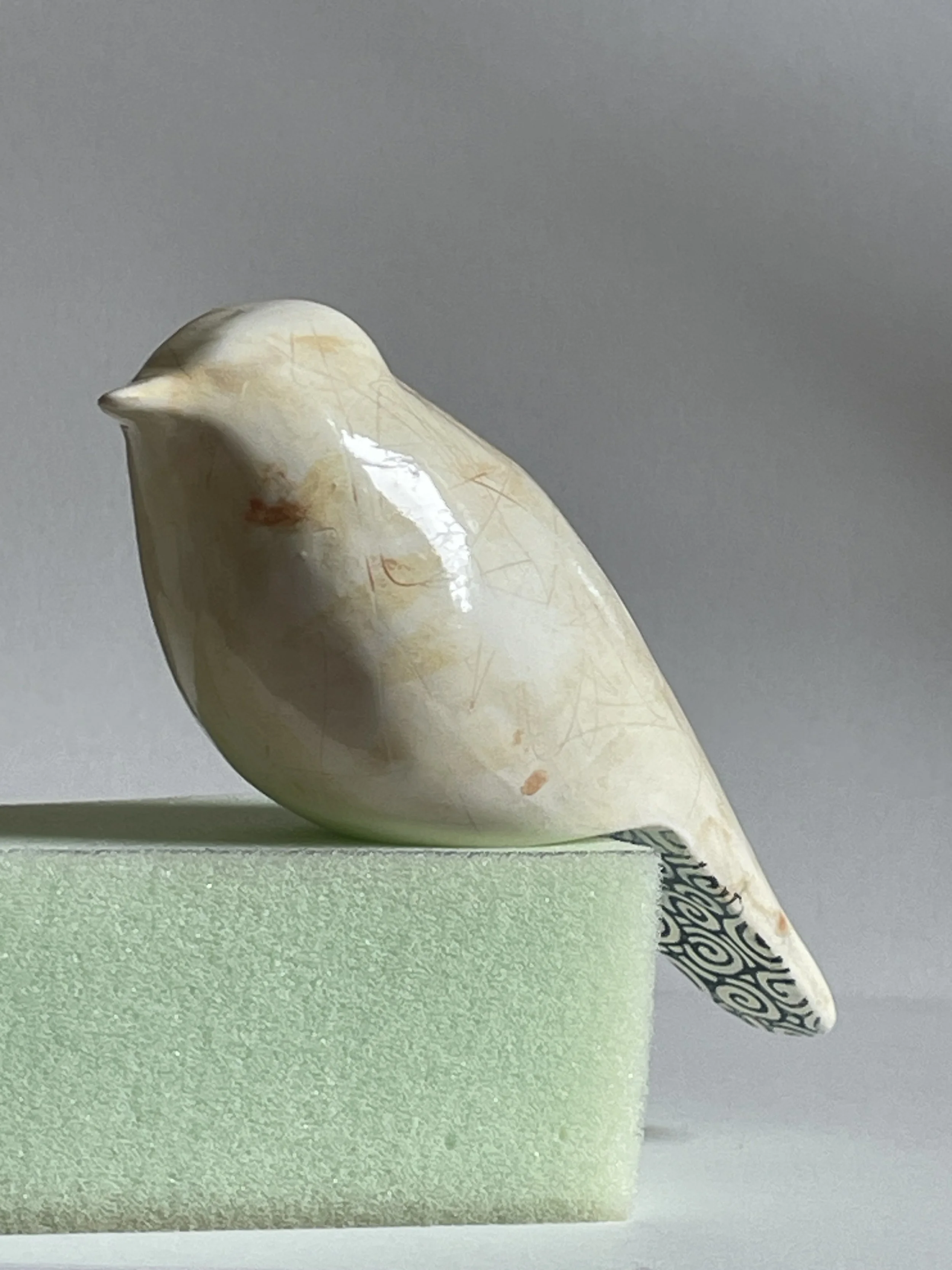 'Overhang bird' 
 hand-built paper clay, 
150 x 55 x 130mm