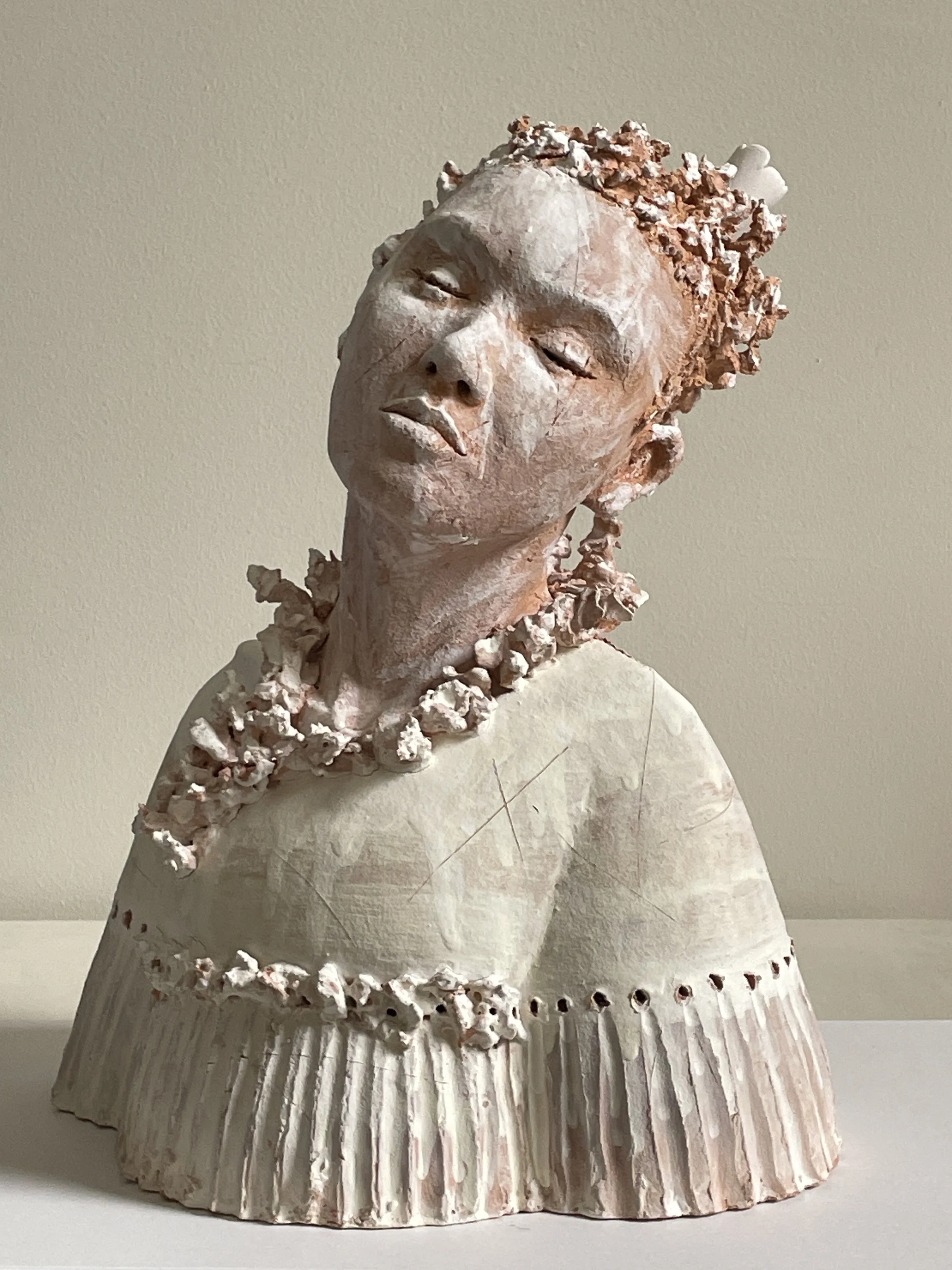 'Banksia Rose' (with handmade crocodile teeth),  bisque fired Raku-T clay, 
320 x 270 x 200mm. 

Impressions and indentations made using real crocodile teeth and osteoderm bones.
