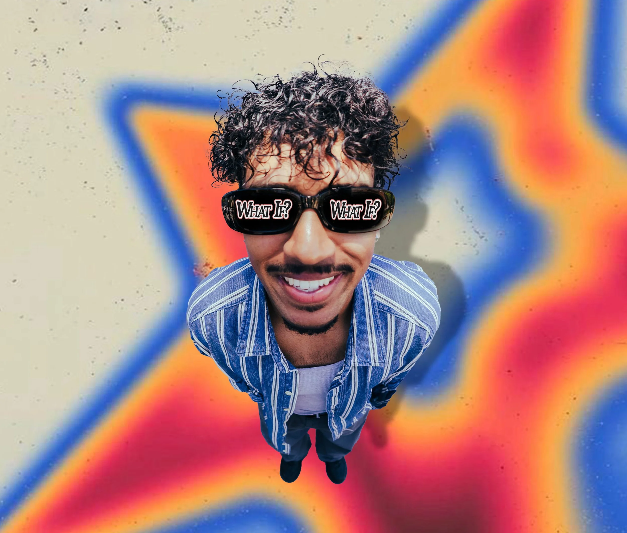 A smiling man with curly hair and sunglasses with the text 'WHAT IF?' on each lens, standing in front of a colorful graffiti background.