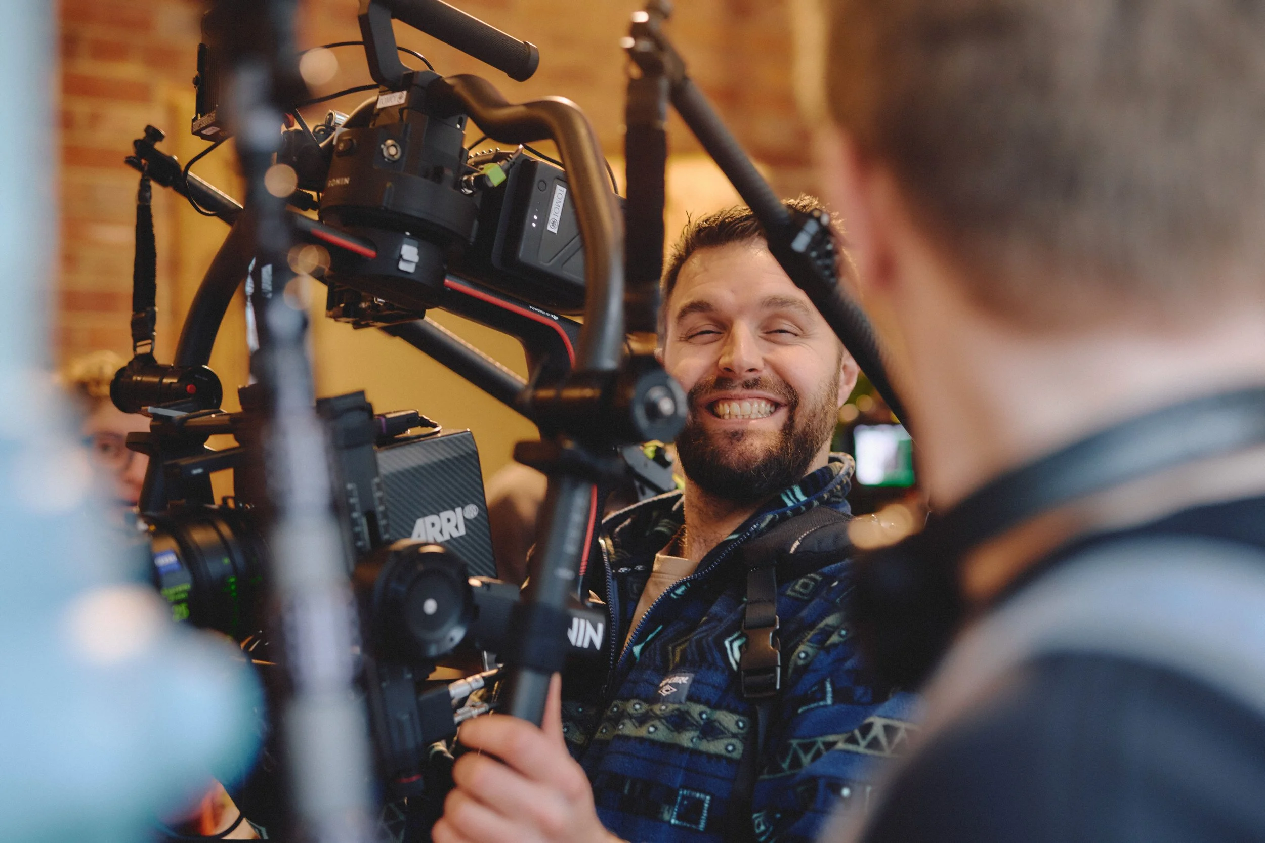 smiling camera operator