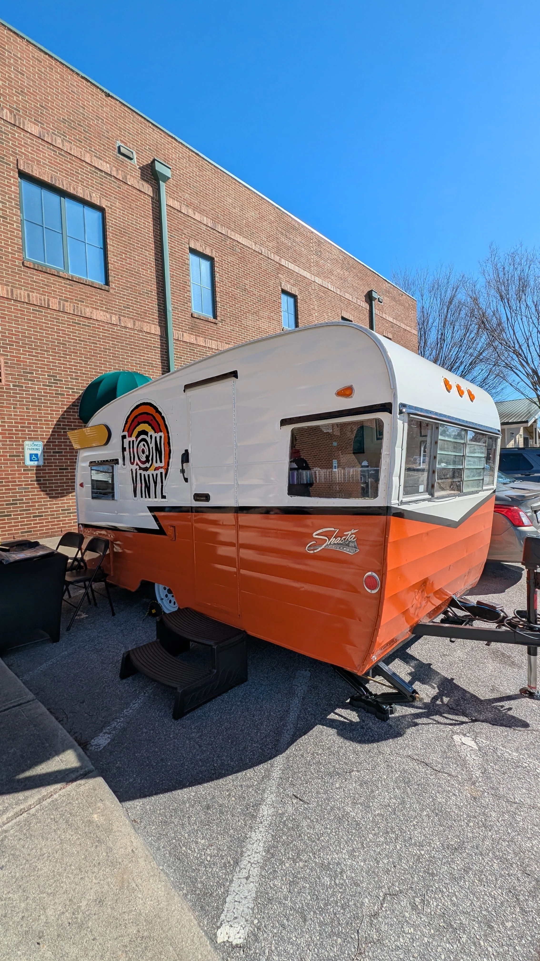 End area of the camper with hitch. Small black trim details