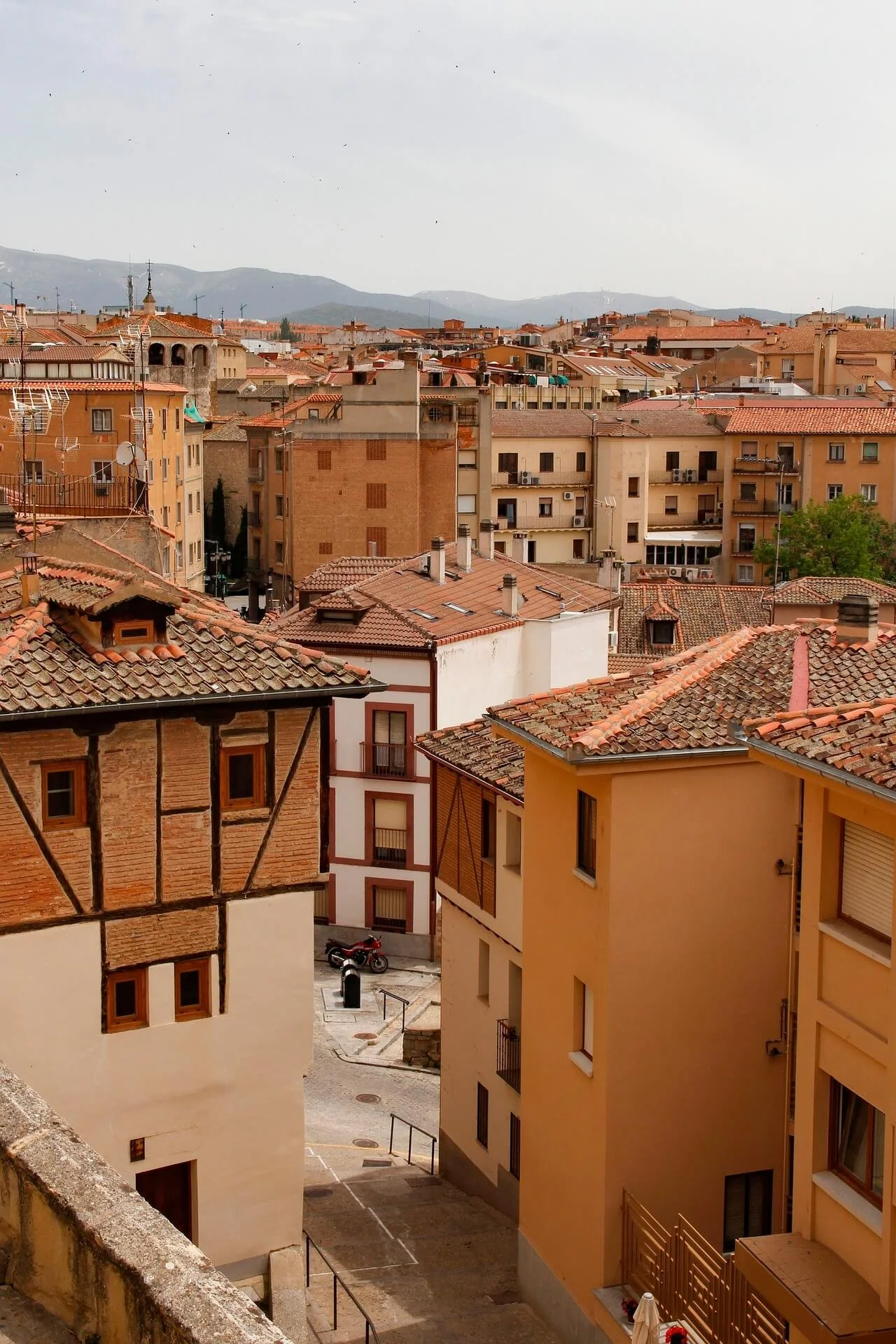 A cityscape with tan buildings.