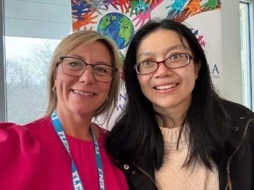 Photo portrait of Idioma's President and Founder Mellissia Walles smiling with alternate route candidate Mei Wang