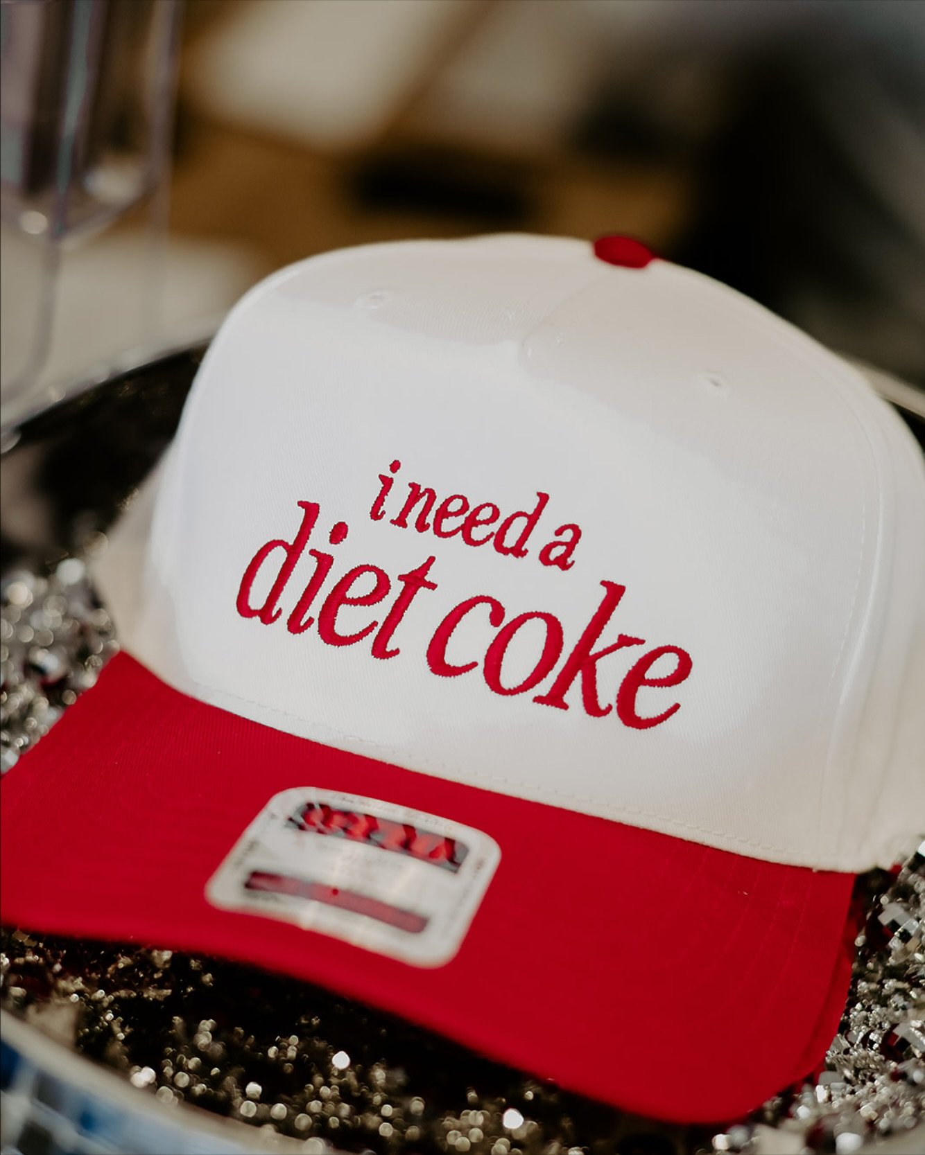 Should we bring the Diet Coke hats back? 🥤 

📸: @simplicity_photo_