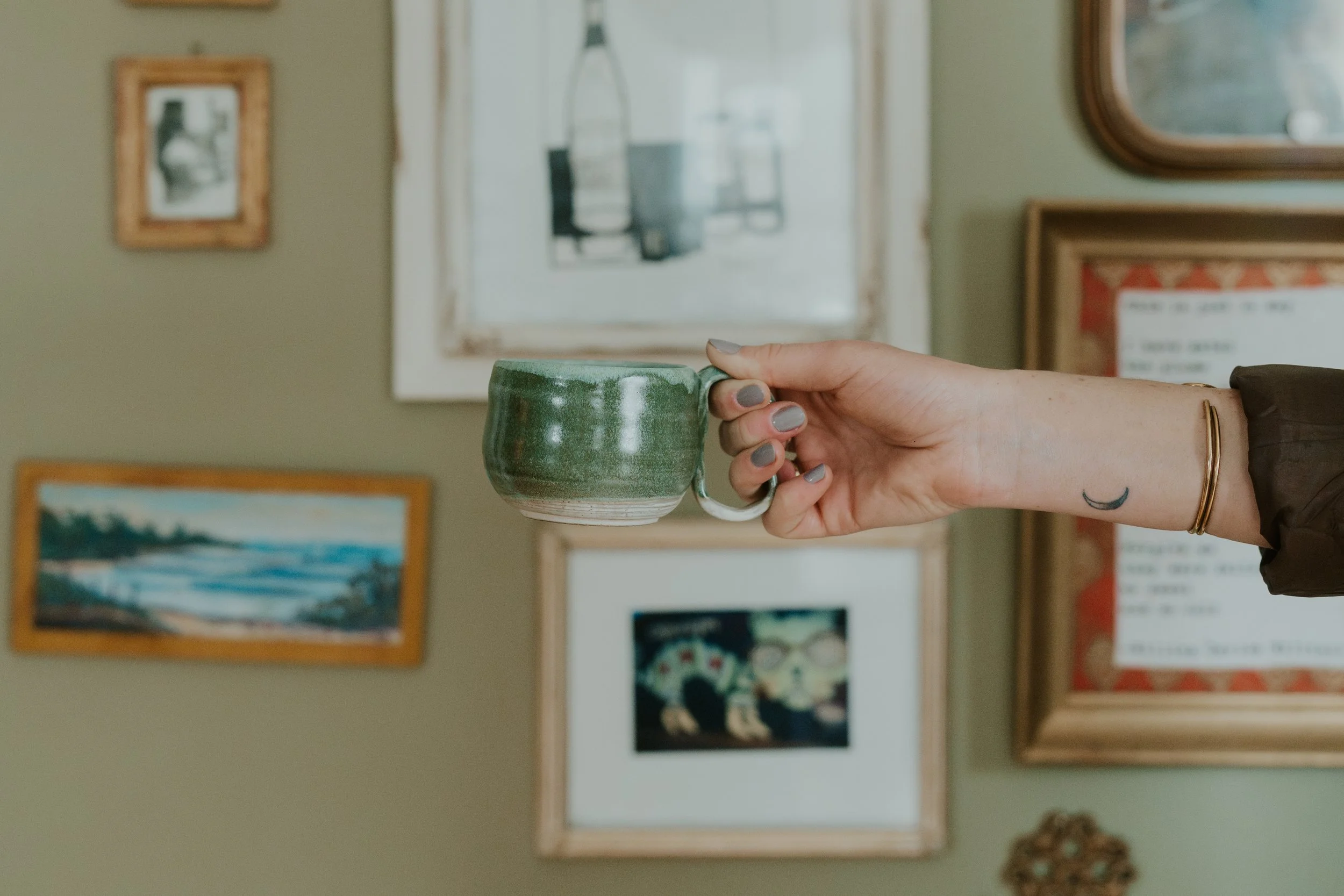gallery wall with coffee mug