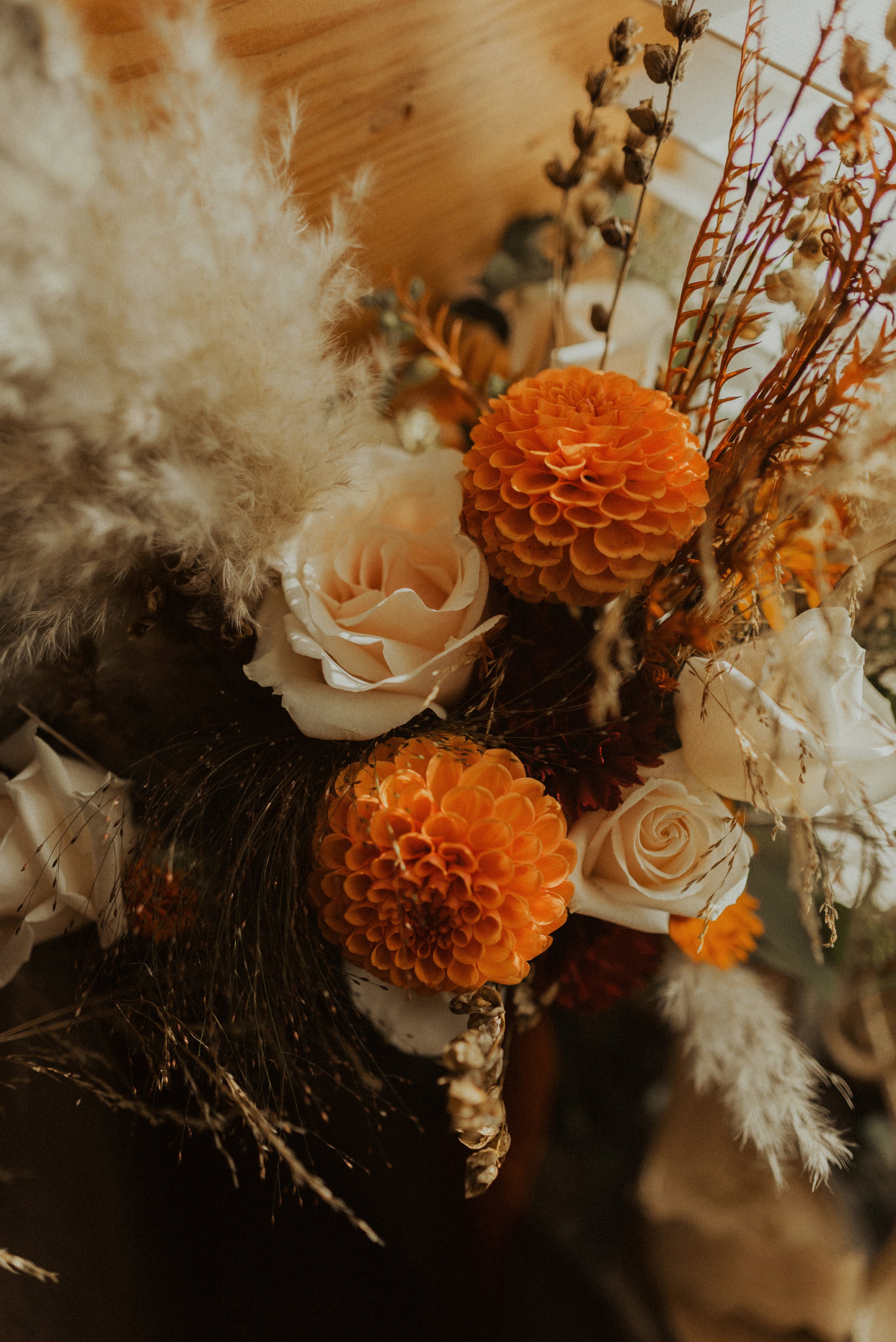 A beautifully crafted arrangement of fresh and dried flowers