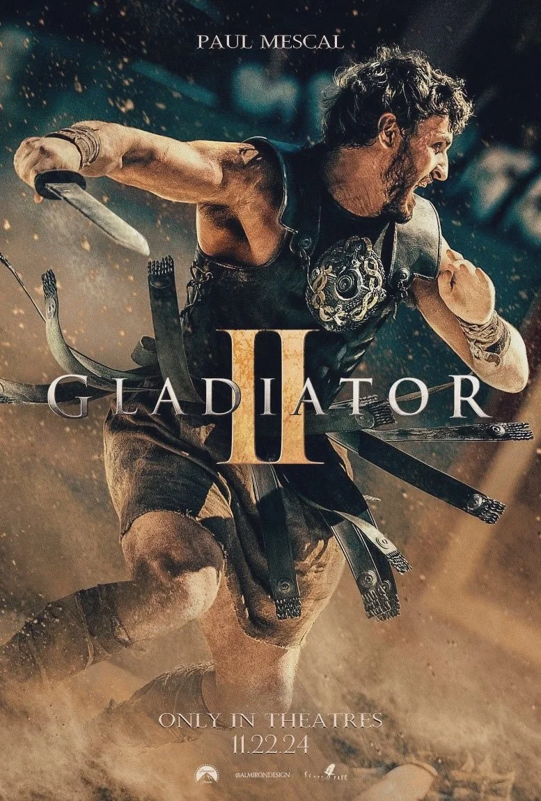 Poster for the movie Gladiator II featuring actor Paul Mescal running through a dusty battlefield in gladiator attire, with the movie title and release date.