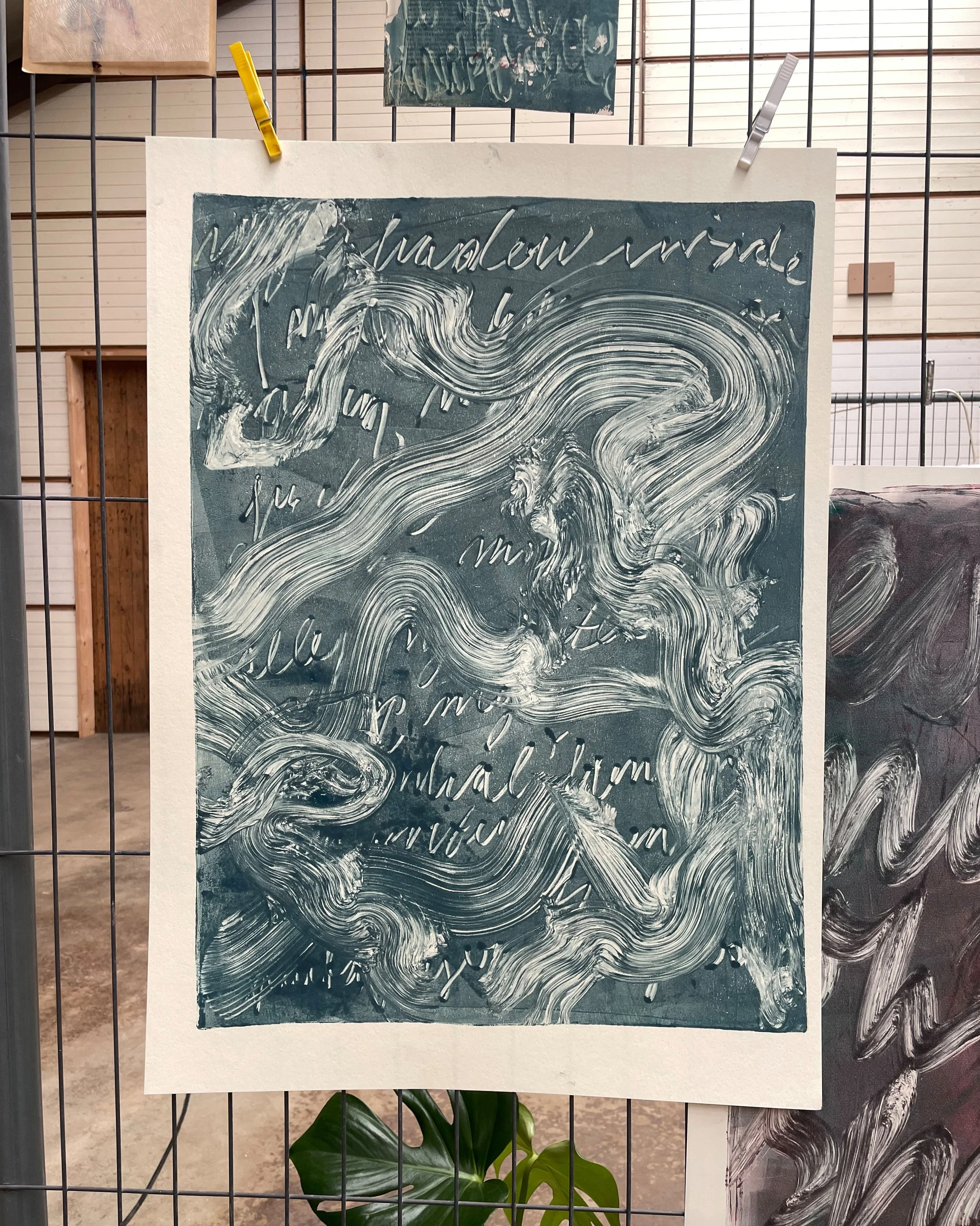 Geometric drawing of an outline square with sections divided by vertical, horizontal, and diagonal lines.