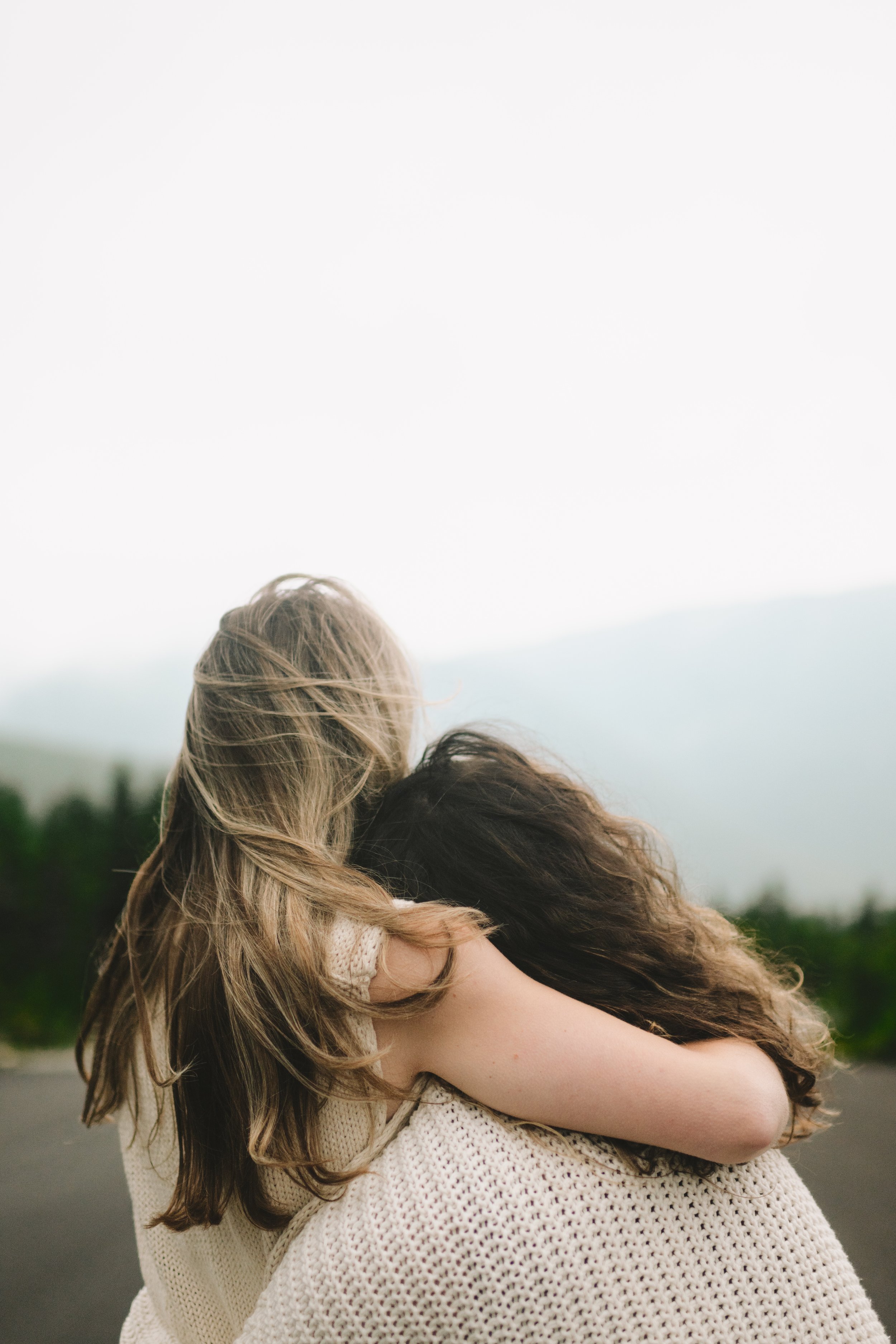 Mount Washington landscape engagement photos lesbian couple in the White Mountains queer mountain engagement session foggy New Hampshire mountains adventure couples photography scenic engagement photos queer photographer wlw vermont elopement