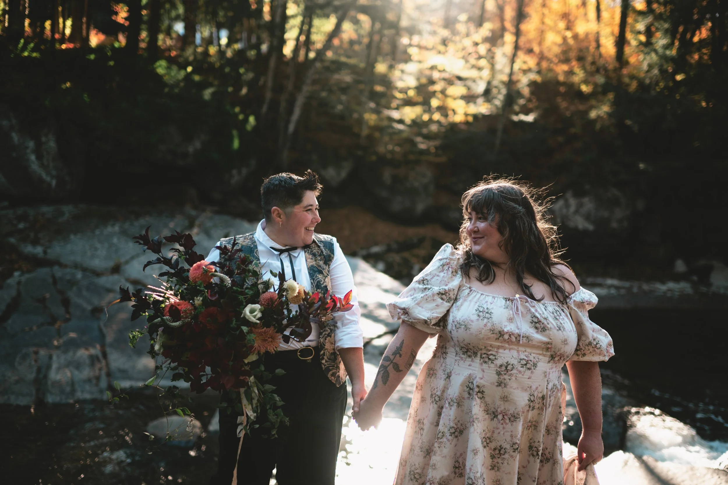 Adventurous New England elopement on a rocky coastline at sunset.  Intimate New England mountain elopement with fog rolling through the peaks.  Couple exchanging vows during a secluded New England forest elopement