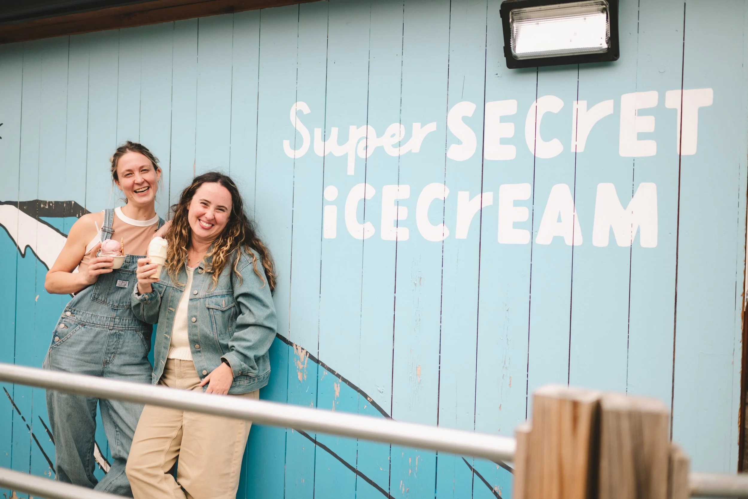 vermont adventure micro wedding elopement lesbian couple ice cream date queer engagement session Super Secret Ice Cream Gorham New Hampshire couples photography candid date night photos documentary engagement photography