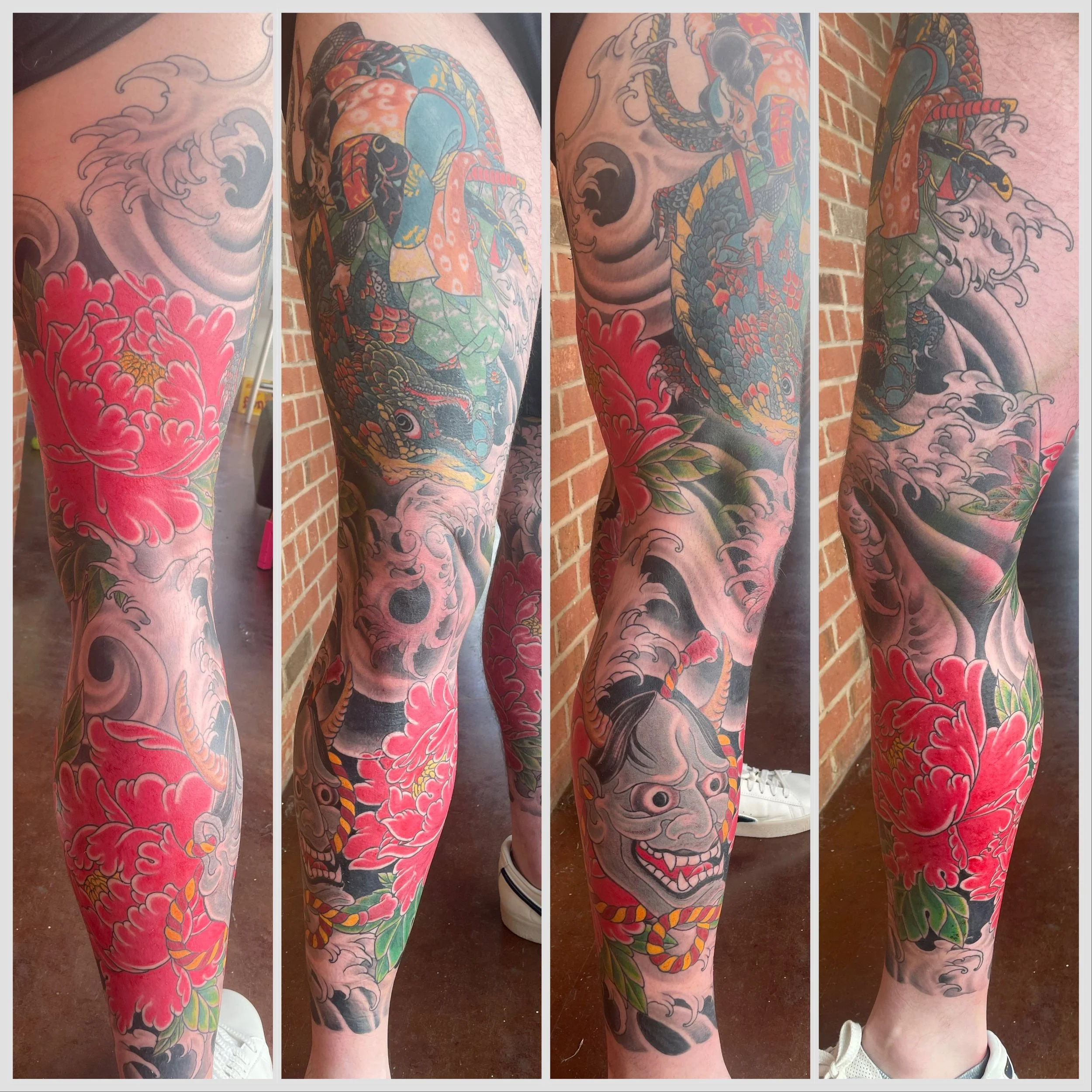 Full leg sleeve traditional Japanese style tattoo featuring a Musashi, red flowers, clouds, and intricate patterns on a person's leg.