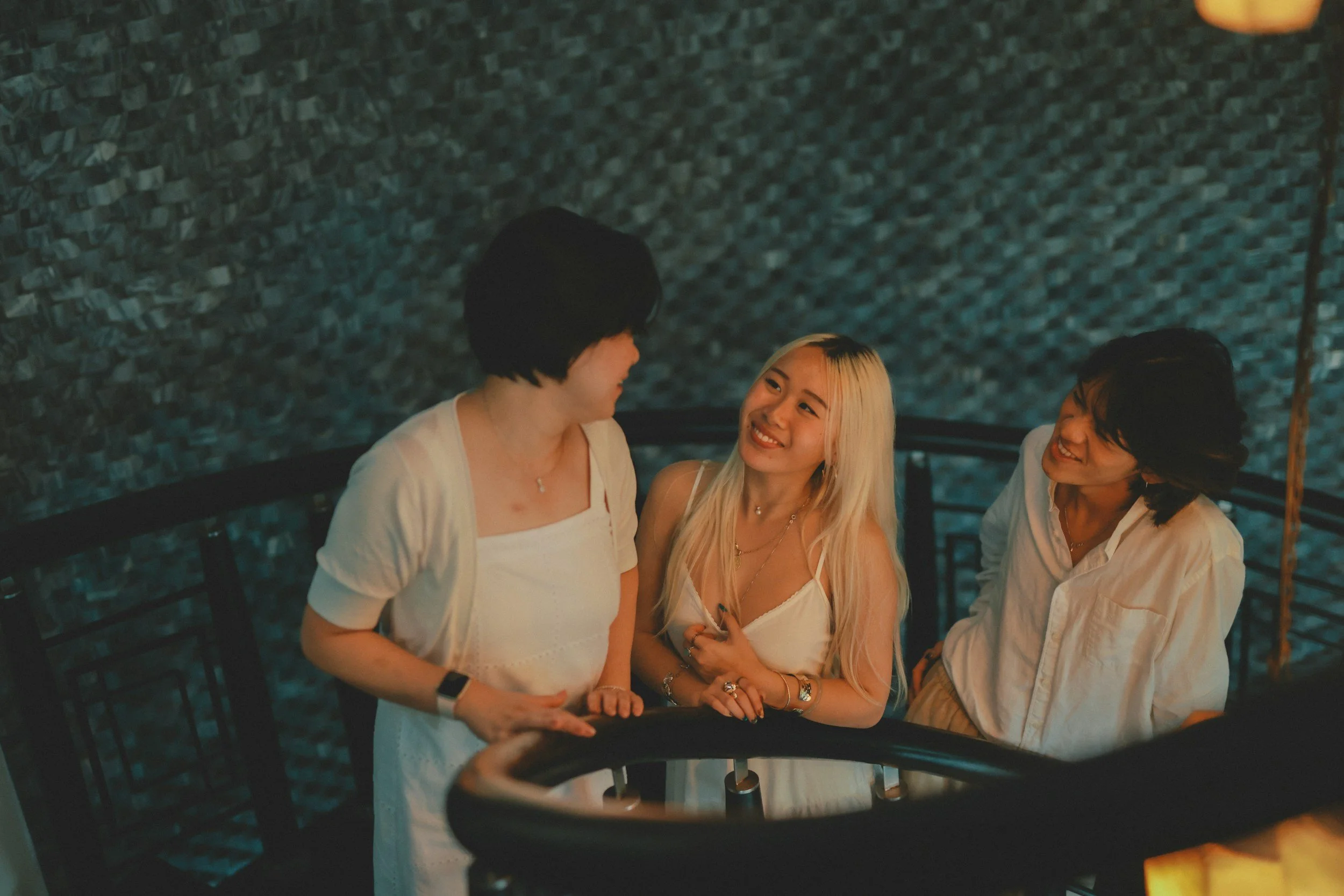 Three people laughing