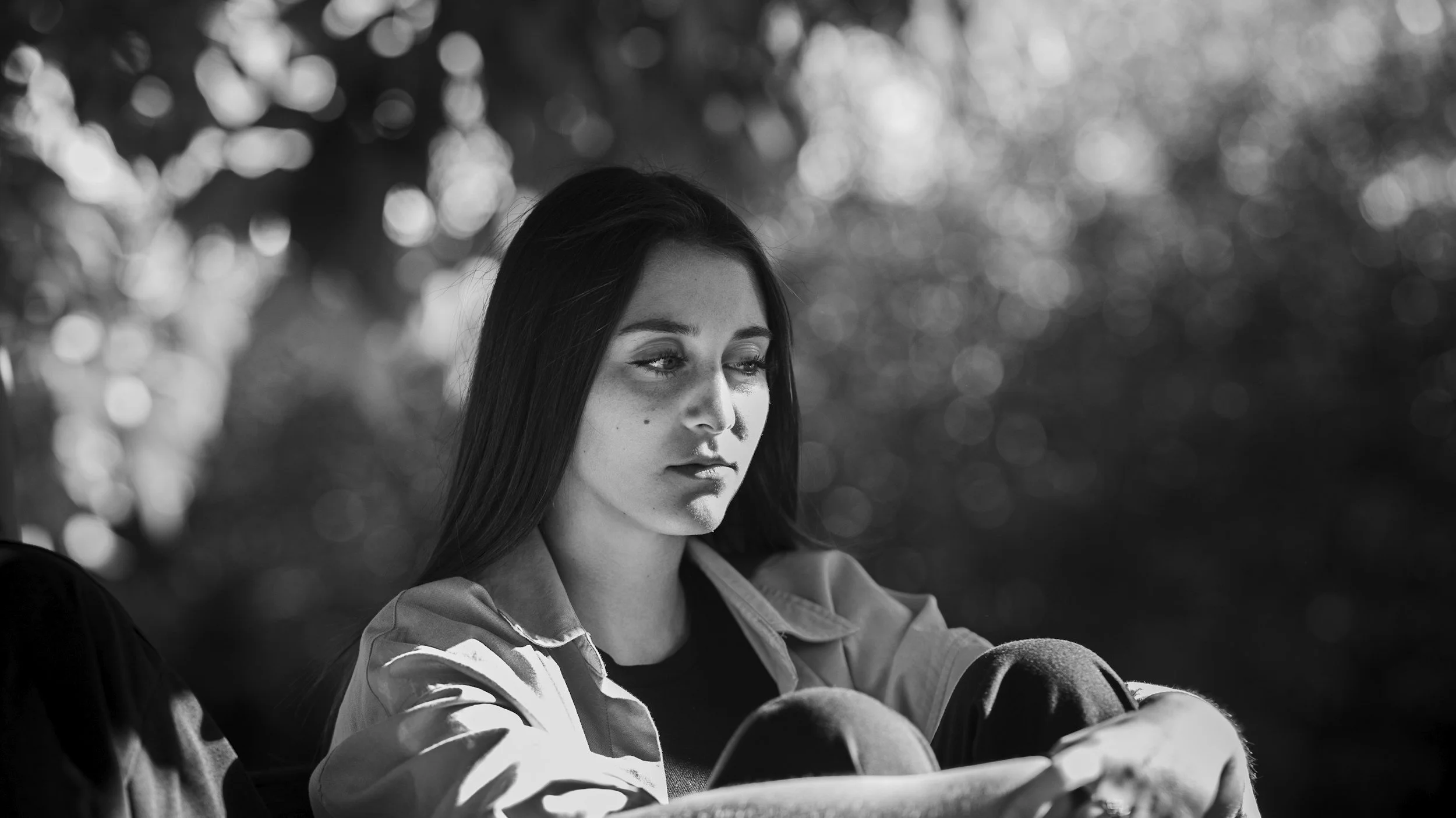 person sitting thoughtfully