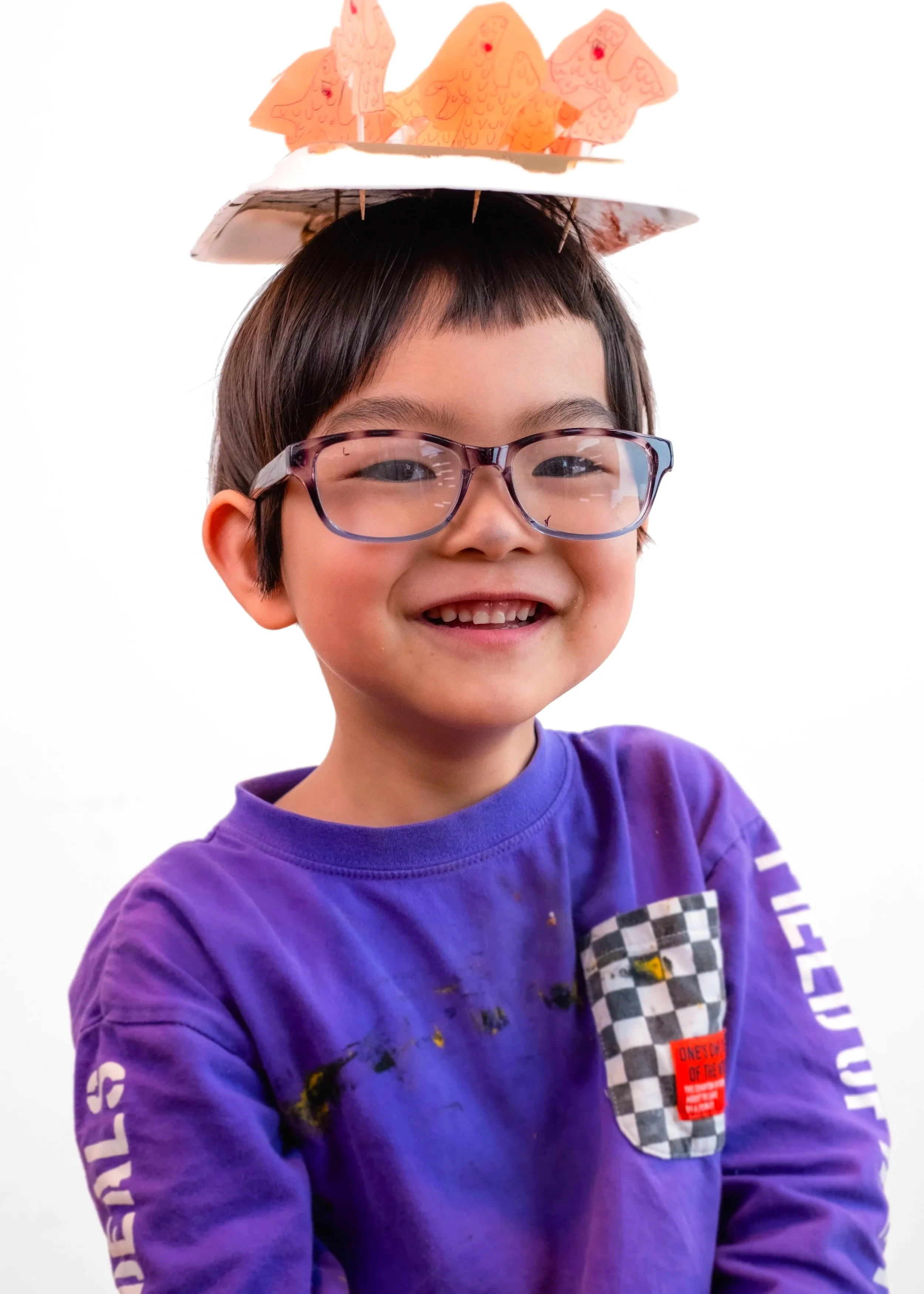 5 year old boy with his art creation