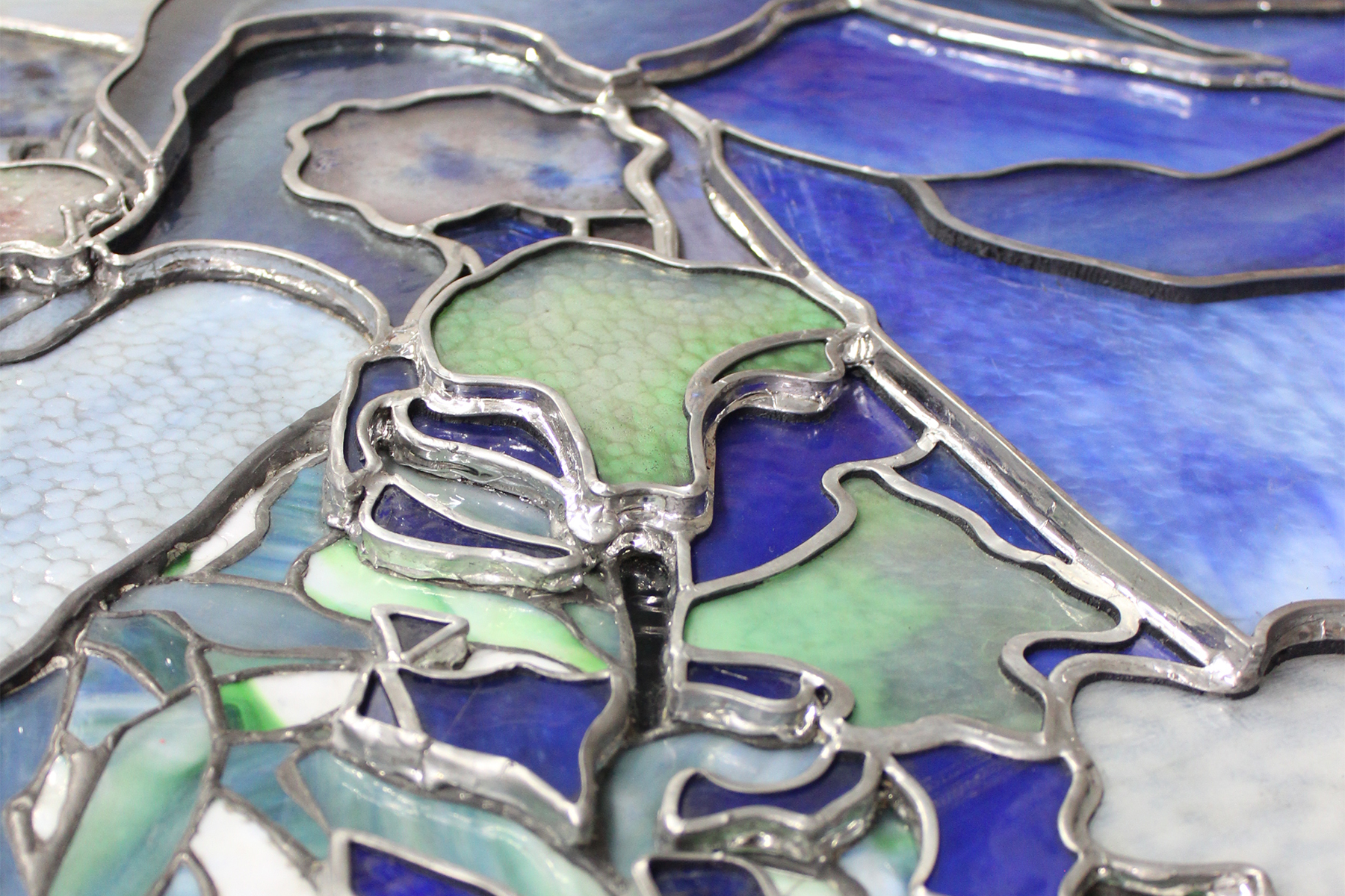 Close-up of layered glass.