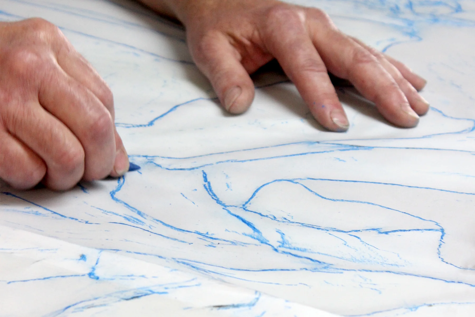 A rubbing is prepared to provide a reference point for the glass once the window is disassembled.