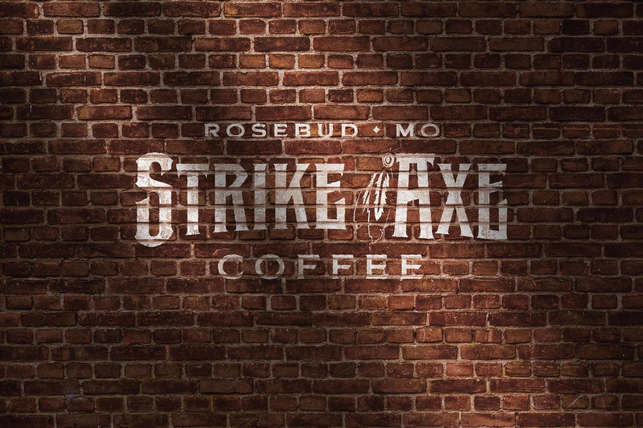 Strike Axe Coffee_Mockup_Brick Wall_Edit 1.jpg
