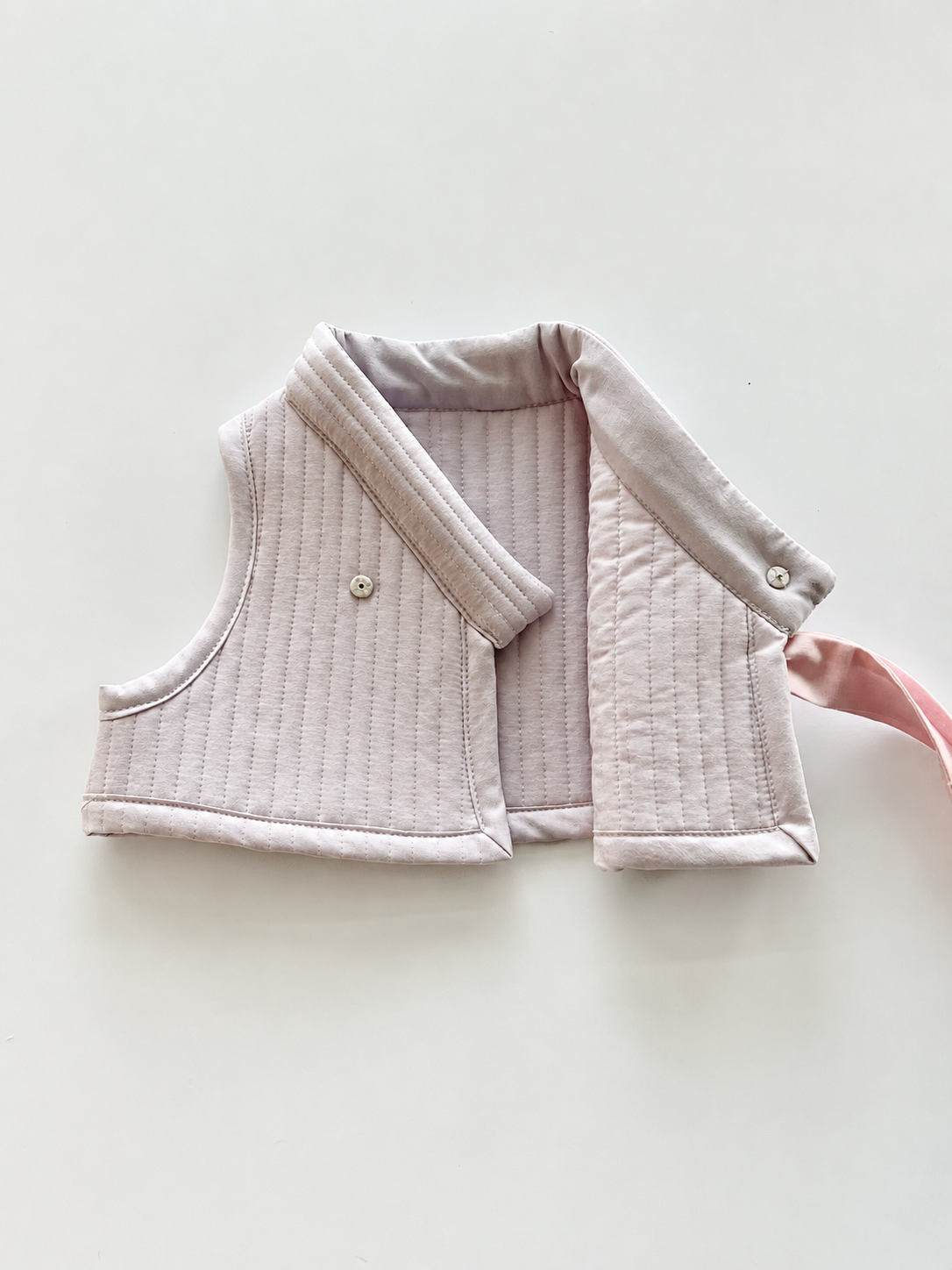 Baby Blush Quilted Vest Flat Lay.png