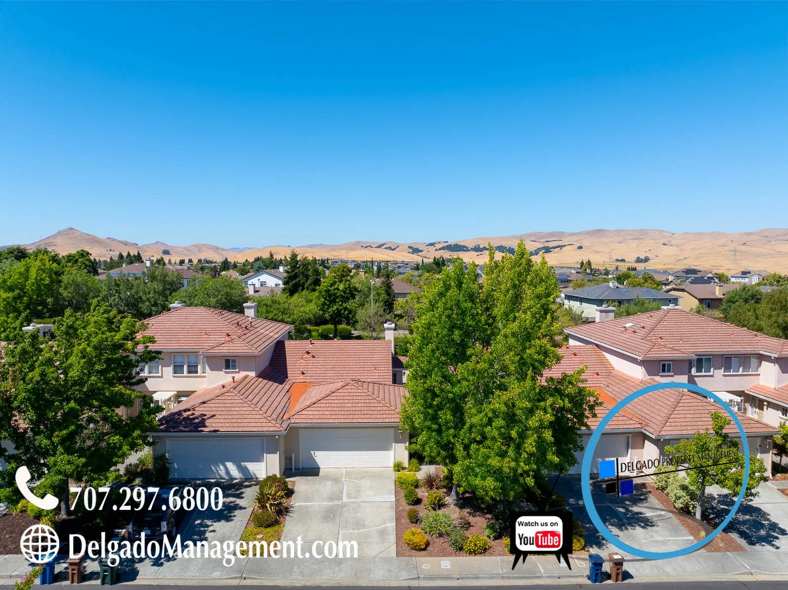 Residential neighborhood with houses, trees, and distant hills under a clear blue sky. Contact information and website for Delgado Property Management are displayed, along with a logo and a YouTube icon.