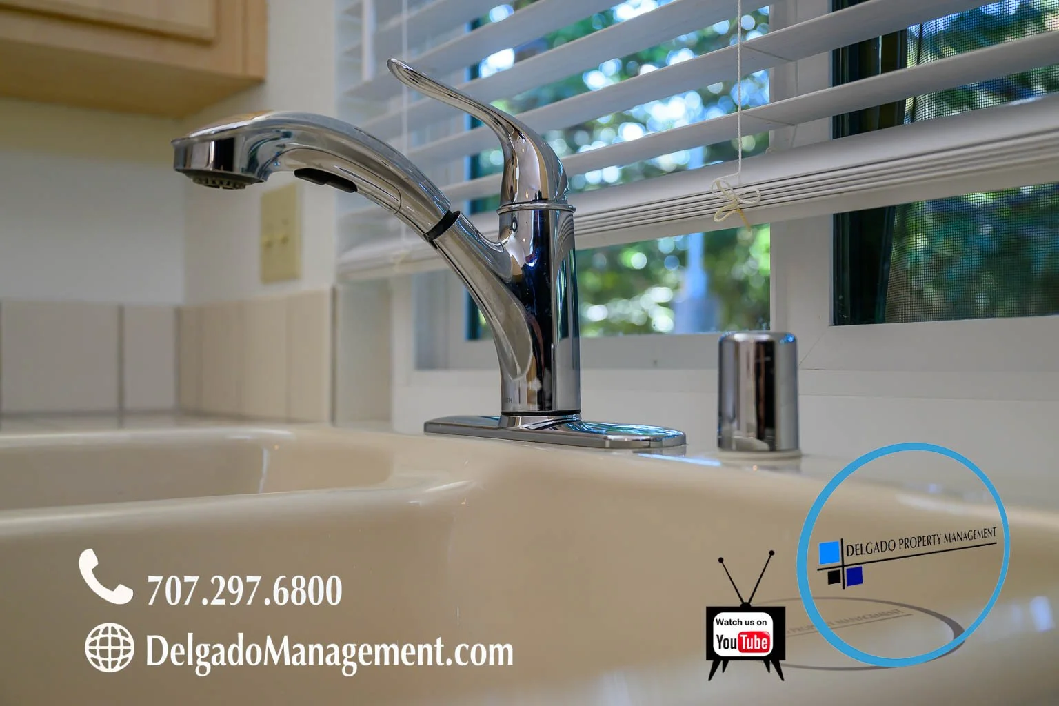 Kitchen sink with a chrome faucet and window with blinds, with overlay text including a phone number, website, and YouTube logo.
