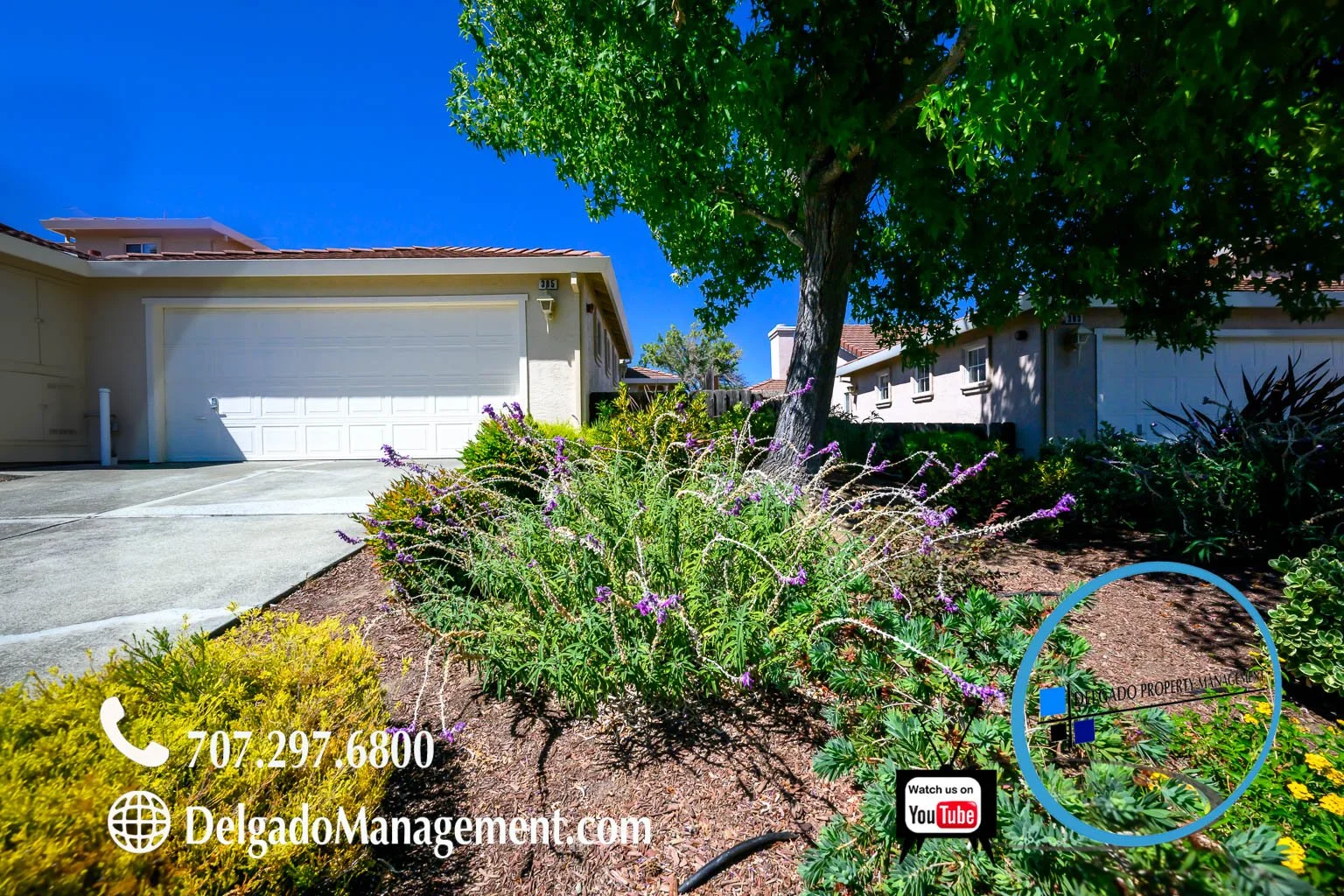 Photo of a residential house with a white garage door, driveway, a large tree, and landscaped garden with purple flowers. Contact information and website for Delgado Management are displayed at the bottom, along with a YouTube logo.