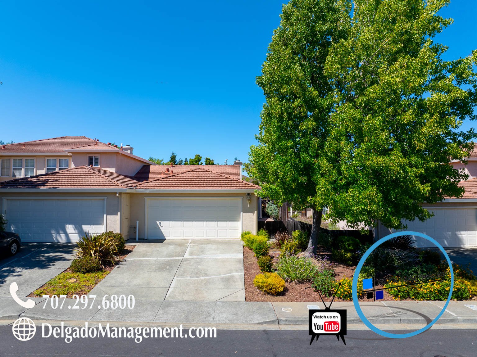 Residential home with three garages, a tree and a small garden area. Contact phone number and website on the lower left, and a YouTube promotional logo on the lower right.