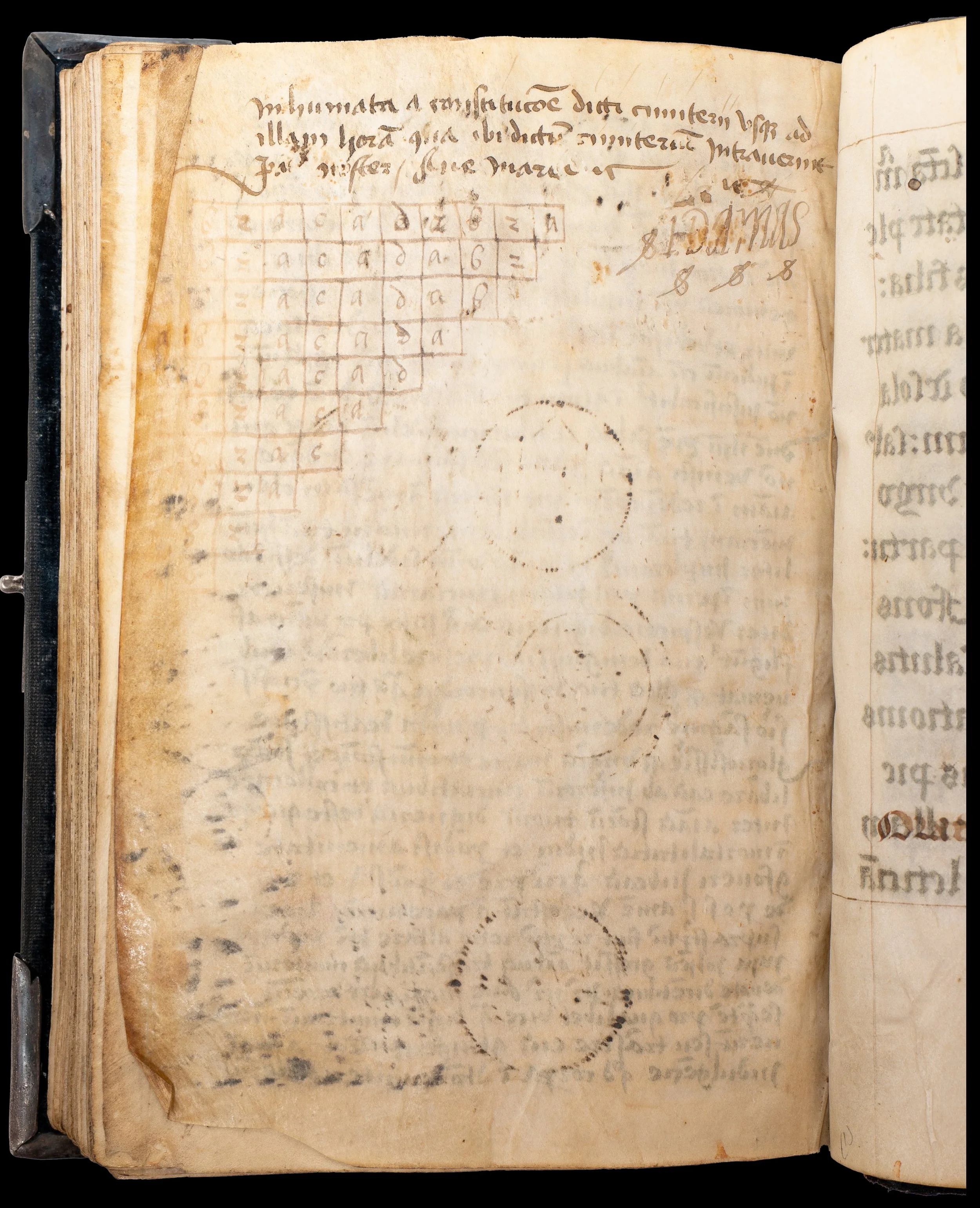 Early ownership inscription apparently reading I. Damas, calculations, and impressions left by pilgrimage badges in the fifteenth-century Bruges Book of Hours