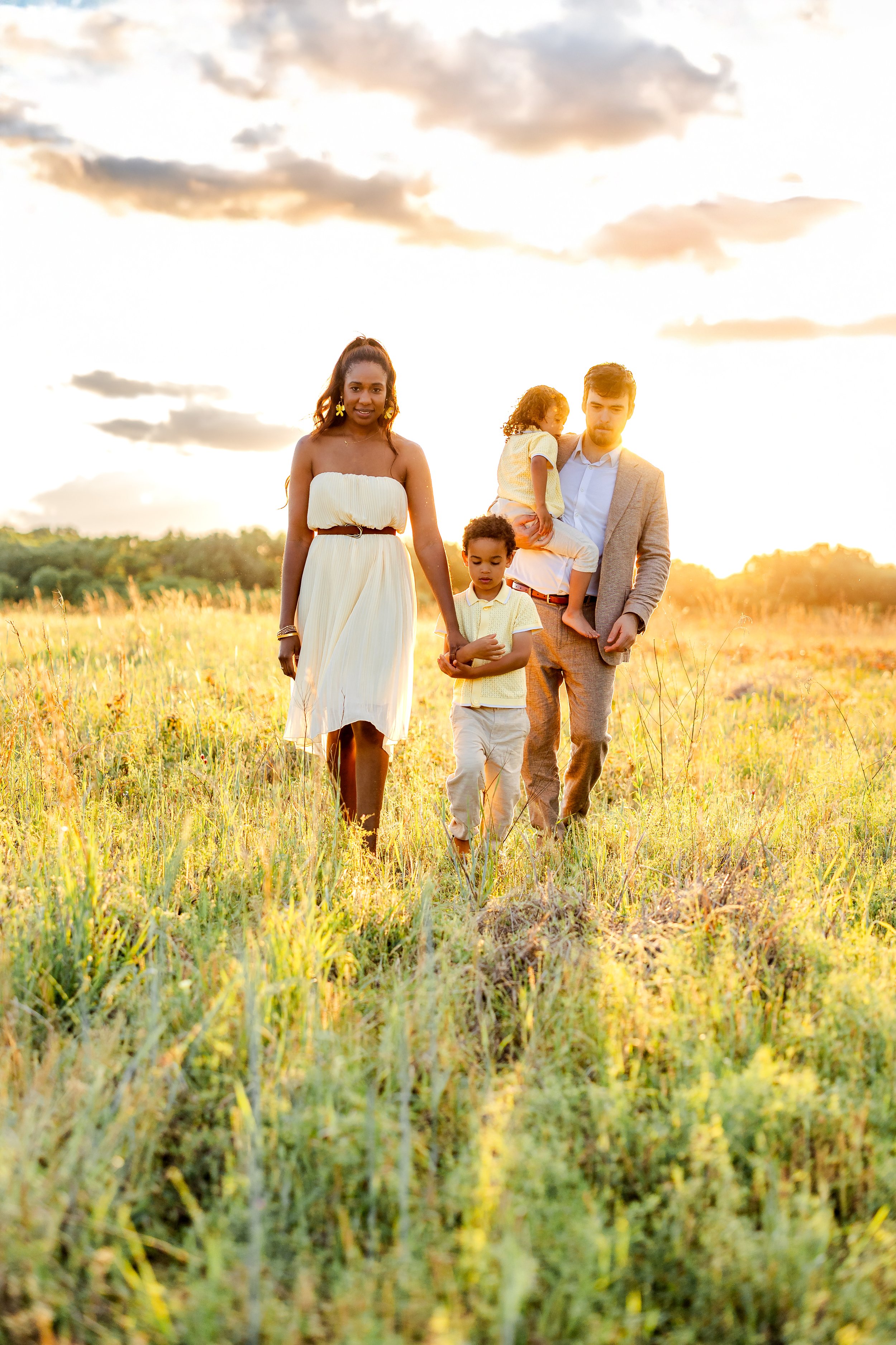 Family-walking-through-tall-grass-memphis-family-photography