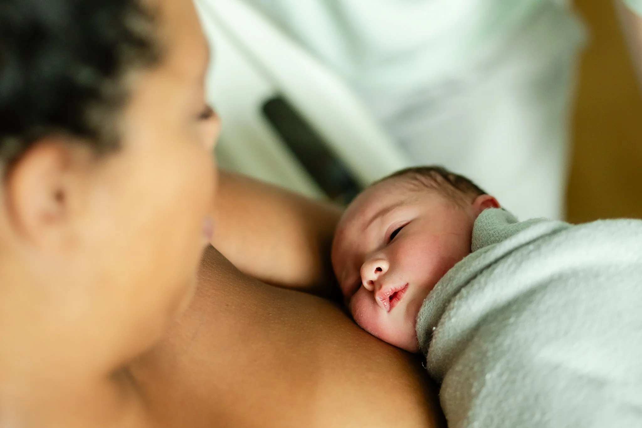 memphis mom holding her newborn son after birth 