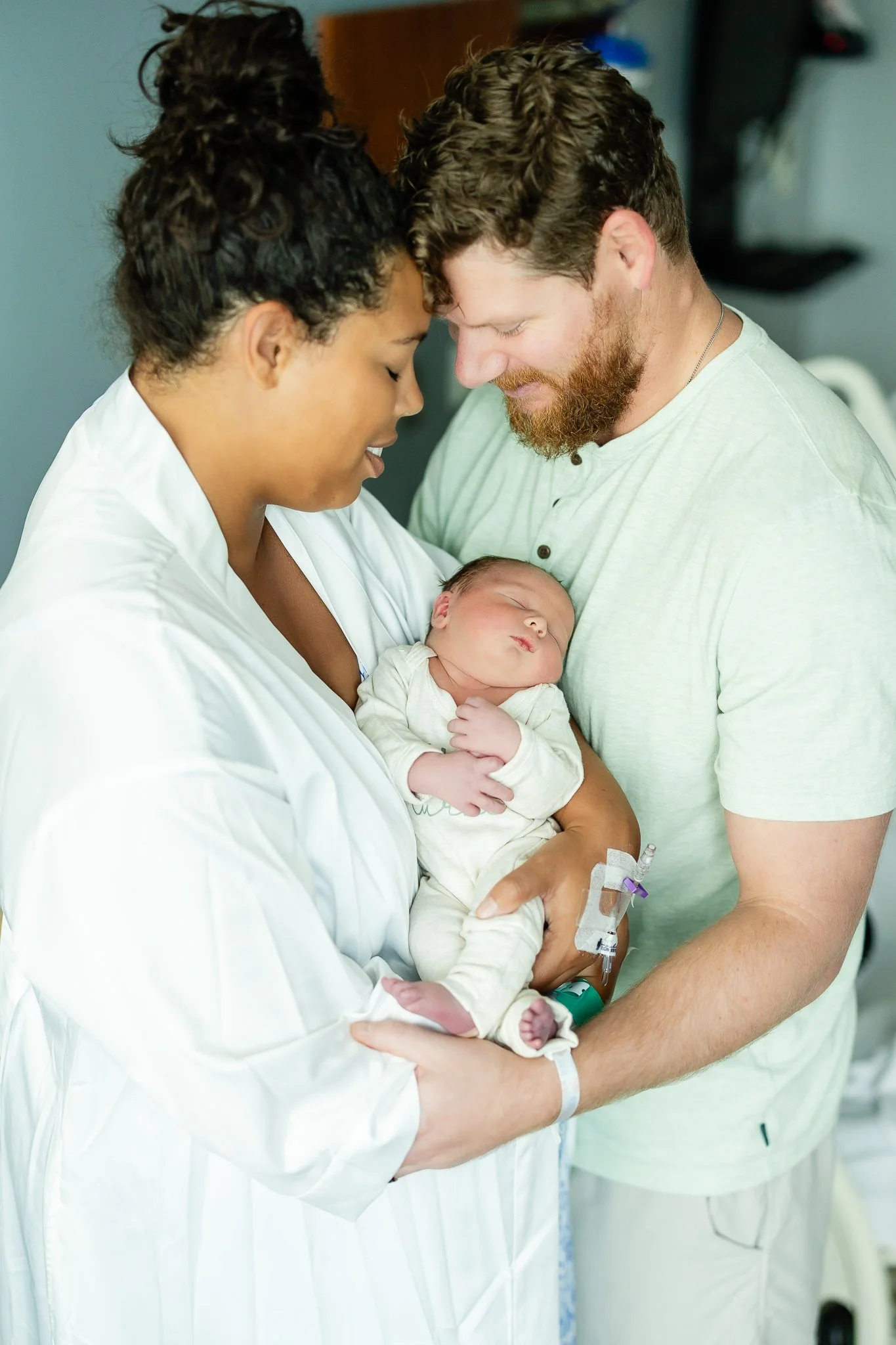 mom and dad and brand new baby in memphis hospital after birth