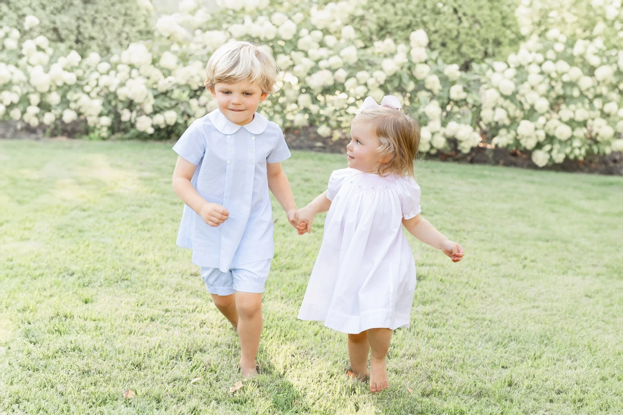 children playing in natural light at family photography session in memphis Tennessee by Caitlin Ross Photography 