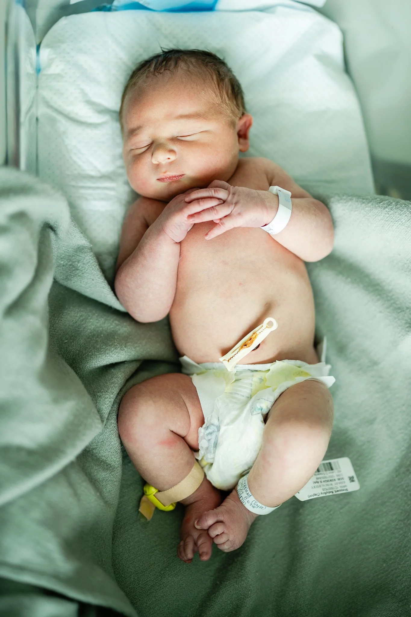 smiling newborn baby boy in the hospital after birth in memphis