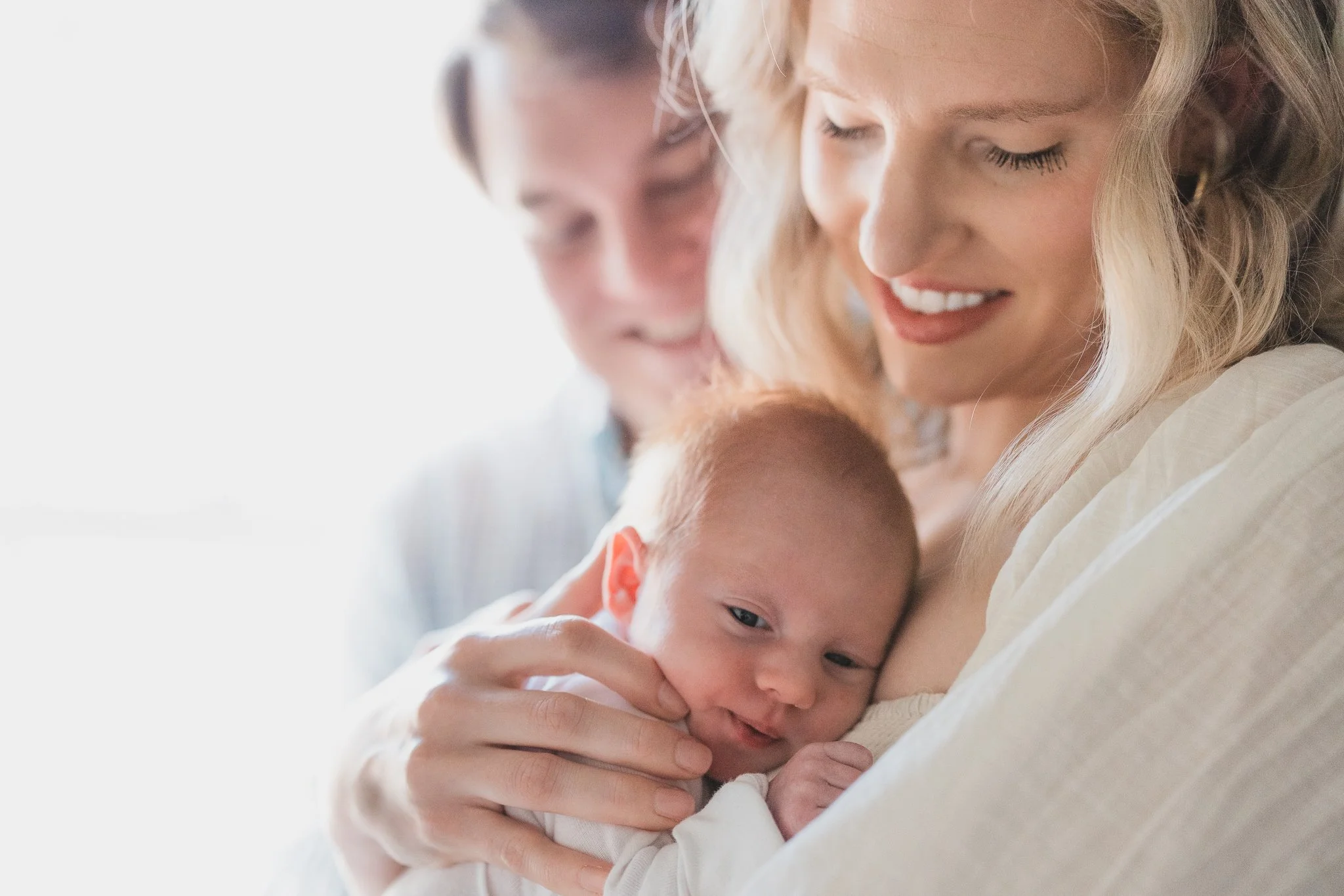 Caitlin Ross is a family and newborn photographer in Memphis TN specializing in outdoor natural light and in home photography sessions