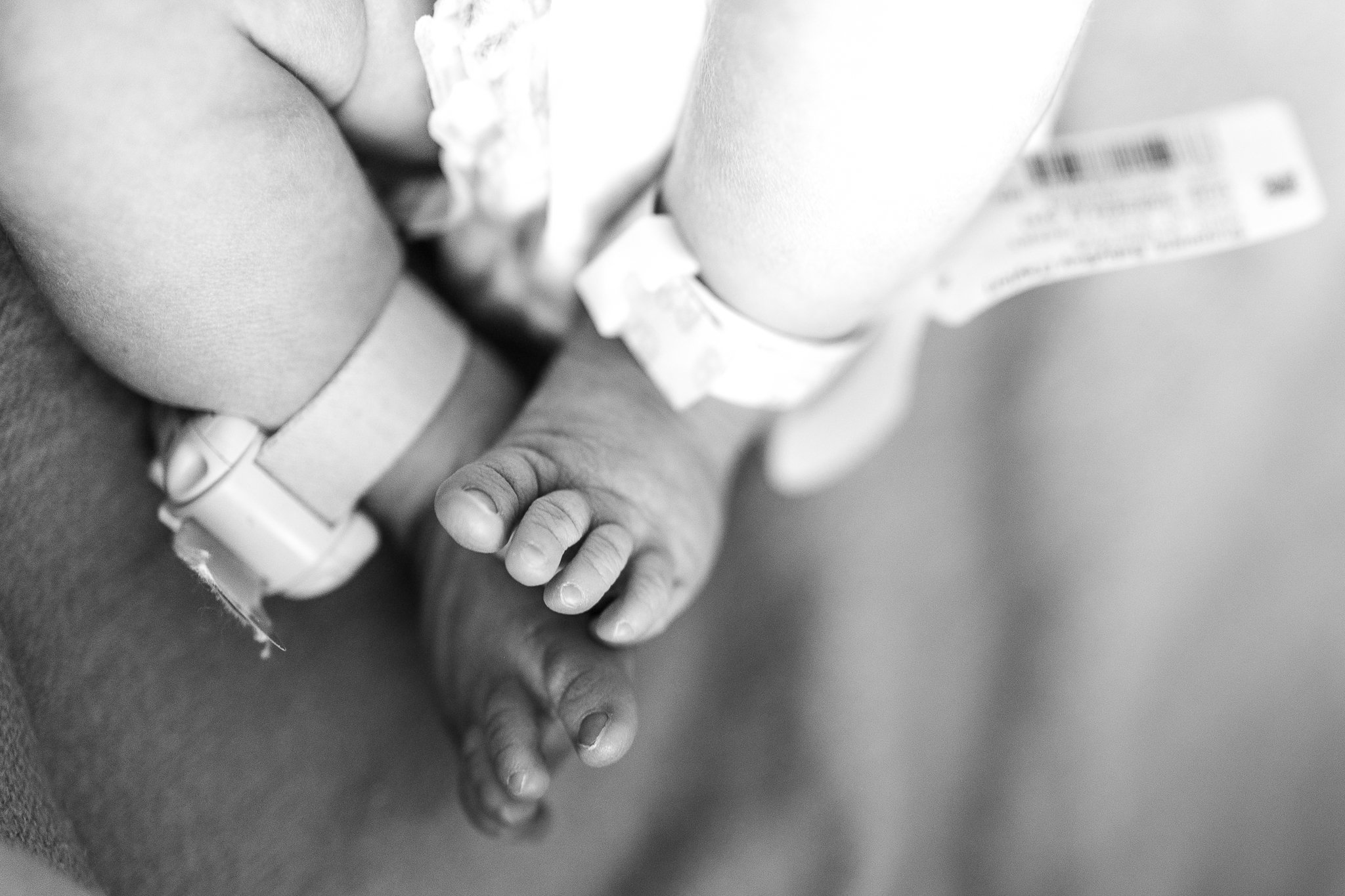 tiny baby feet of newborn baby boy in memphis tn hospital right after birth