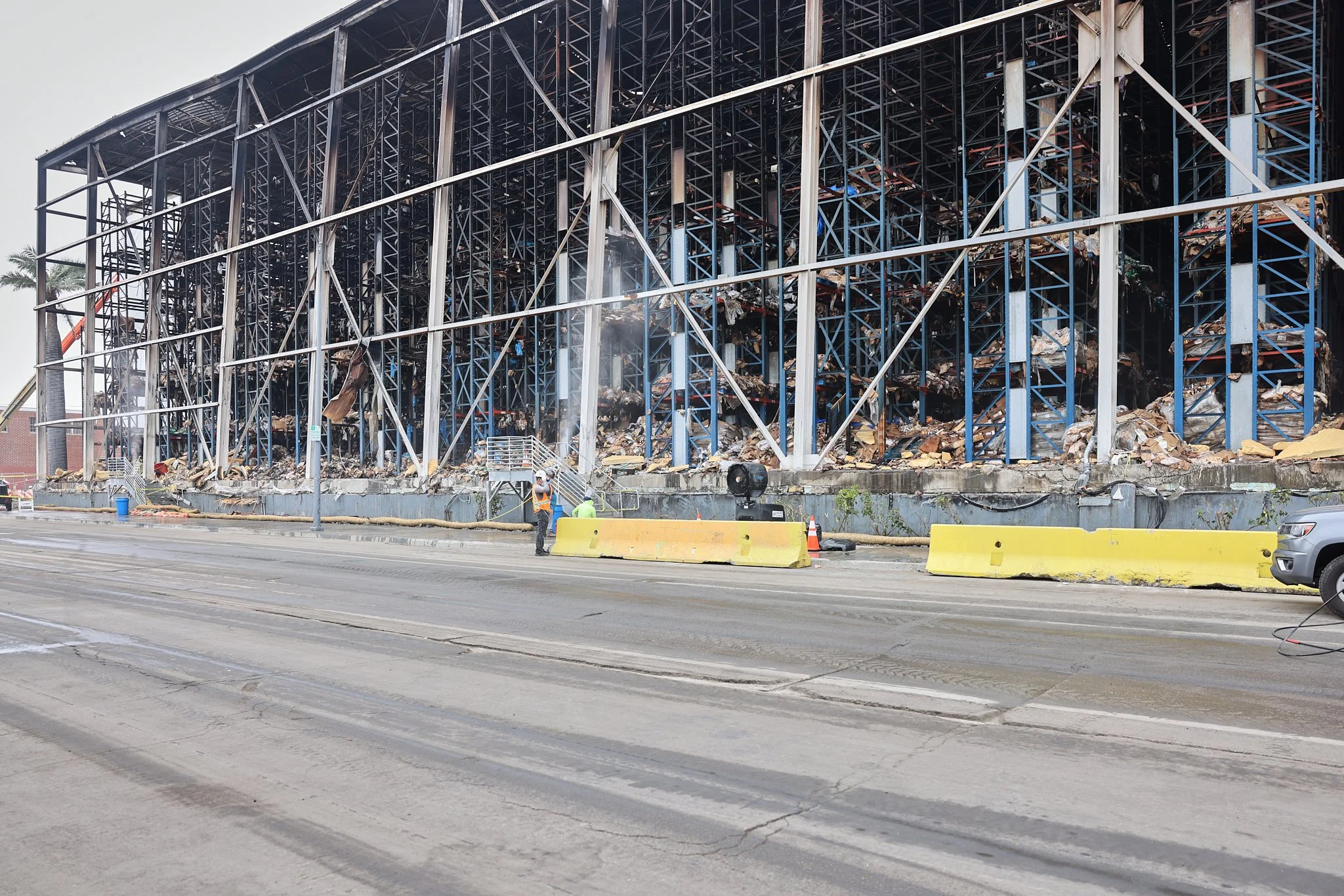 View from Union Pacific Street of the structural damage to the food storage warehouse on July 2, 2026, in Los Angeles, California. The site has become a hazard to residents of Boyle Heights and East Los Angeles due to millions of pounds of decaying f