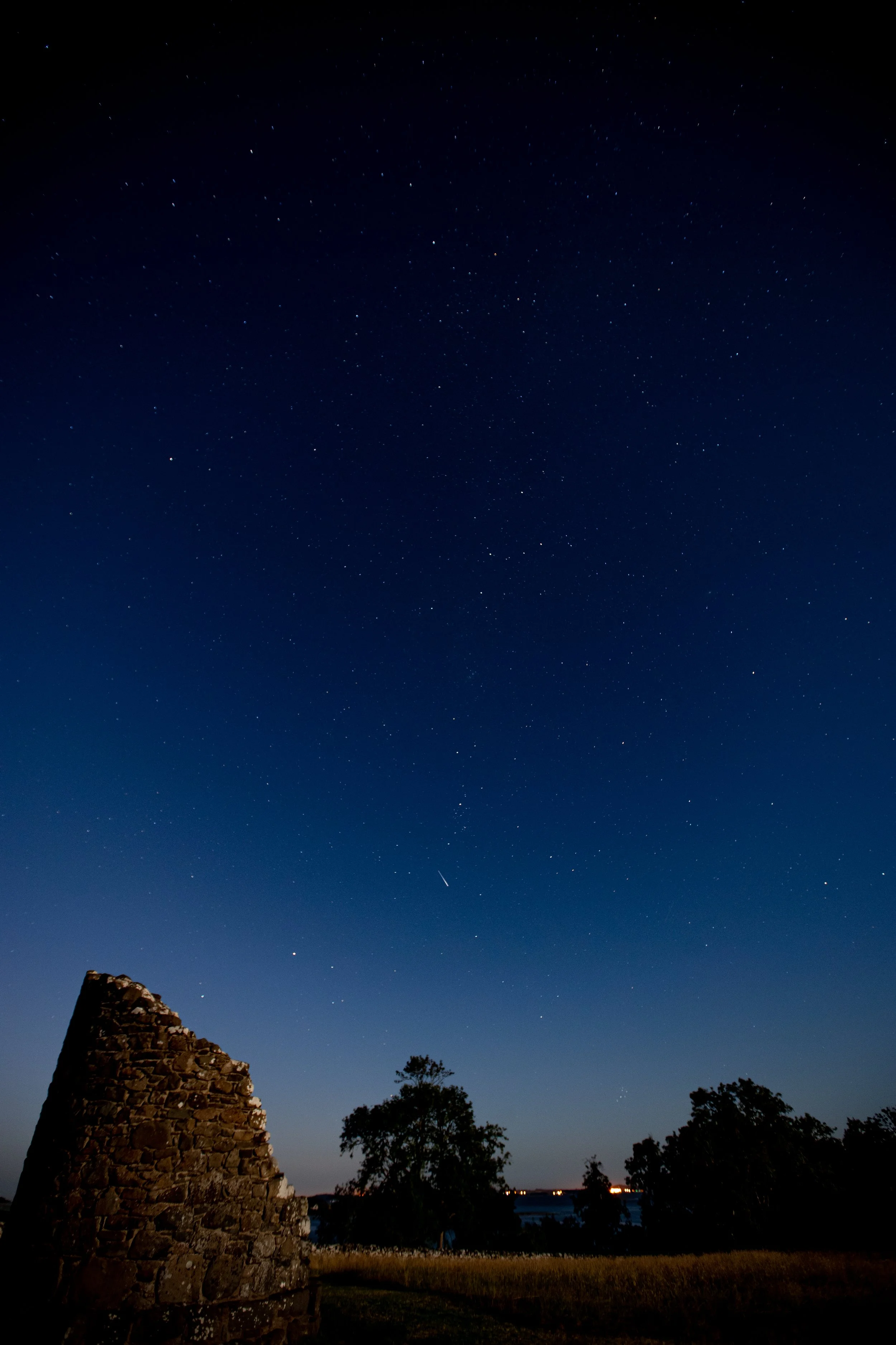 A Meteor lights up as it enters the Earth's atmosphere. Taken at Nendrum Monastic Site. Mahee Island, Comber, Newtownards BT23 6EP