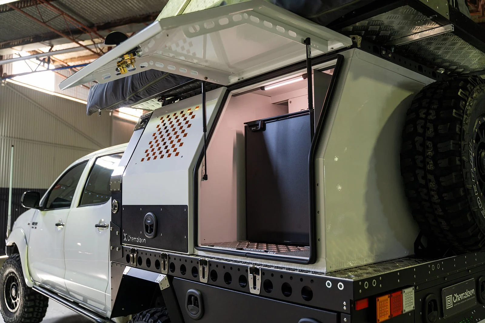  200Ah of lithium batteries power this Bushman 85lt upright fridge and dual colour LEDs. 
 SR5 twin door Gullwing and upright fridge  