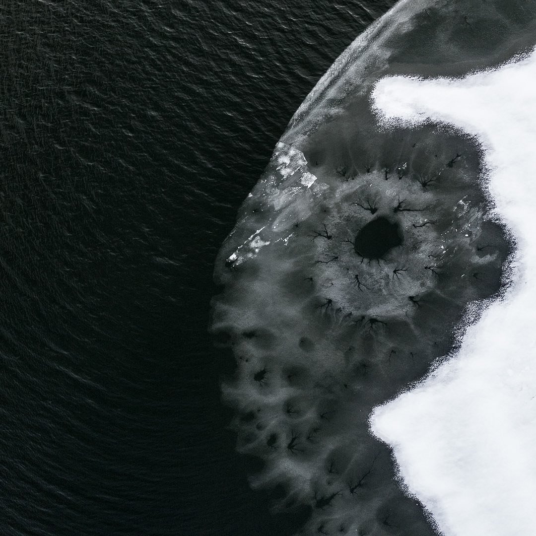 The lake freezing over, or the moon?