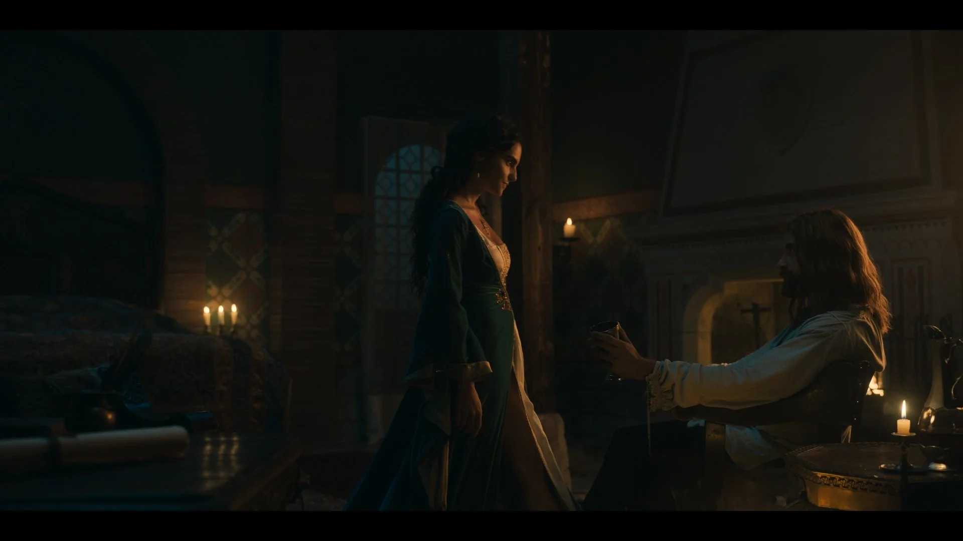 Elena Rusconi as Giulietta di Brienza and Gellért L. Kádár as János Hunyadi in a candlelit room in Milan. A still from Rise of the Raven. Cinematography by Daniel Garas.