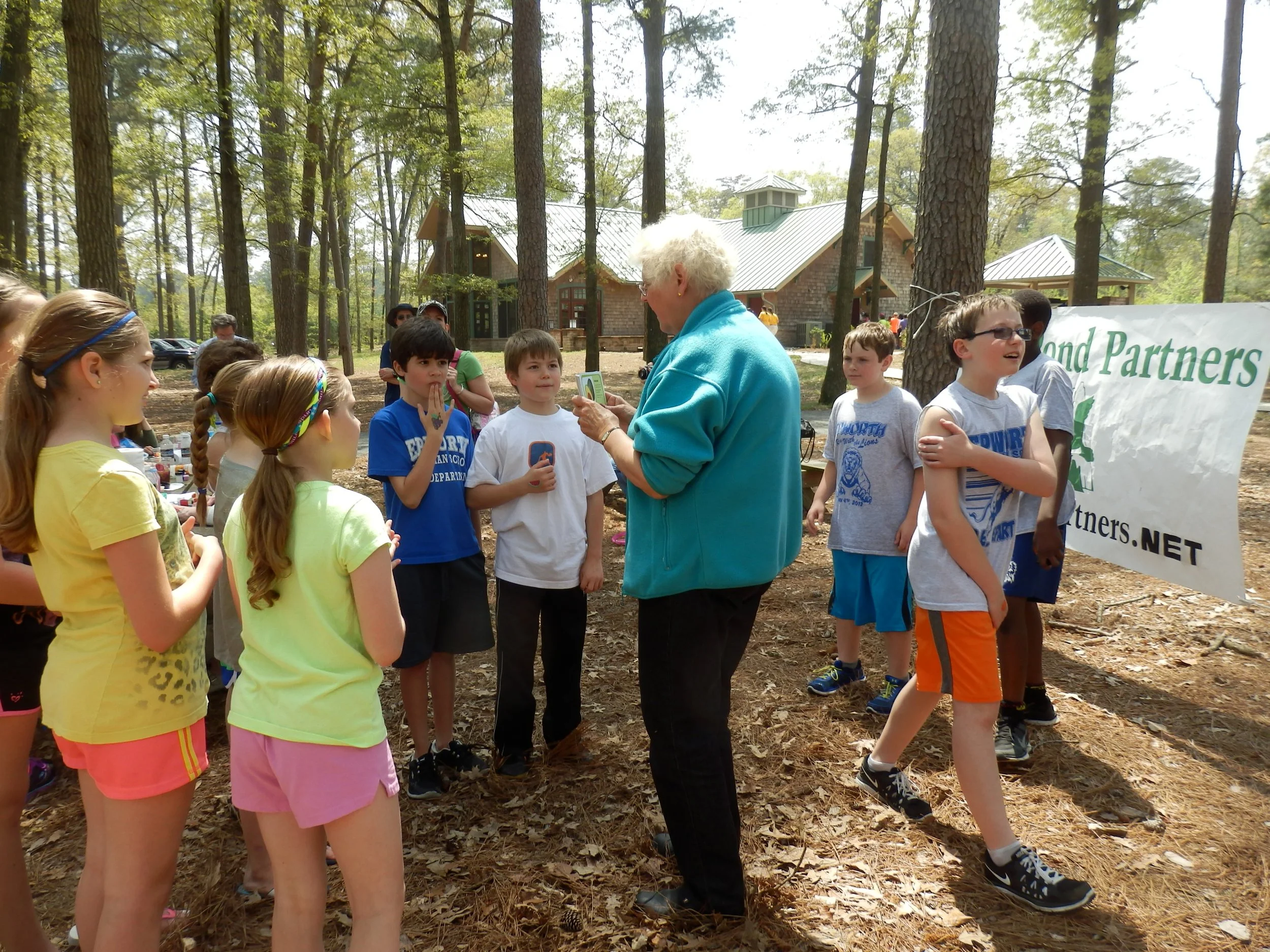 Biddi quizzing 4th grade kids.JPG