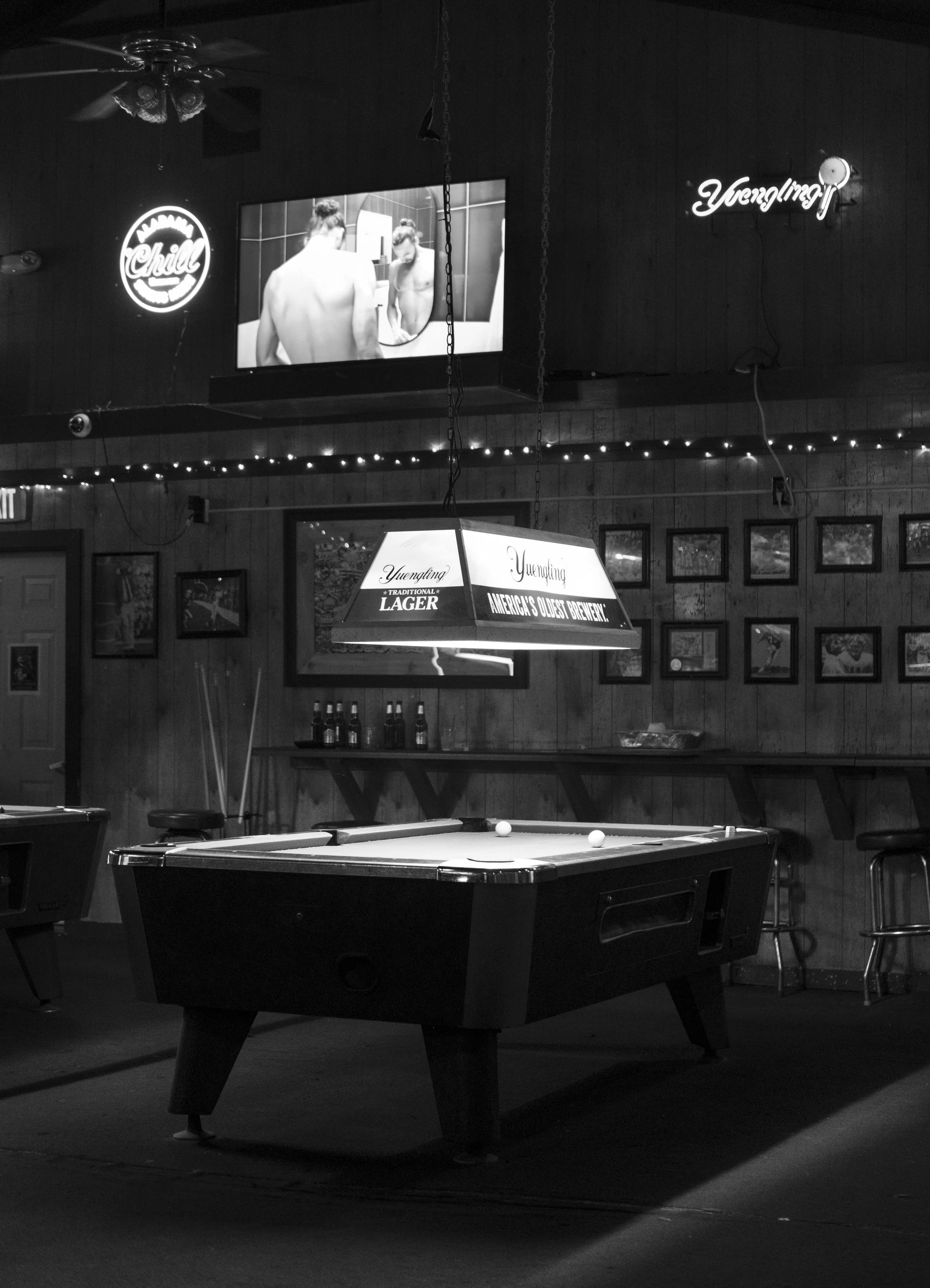 Derakhshani_M_EmptyBeerBottlesAndAPoolTable_07.jpg