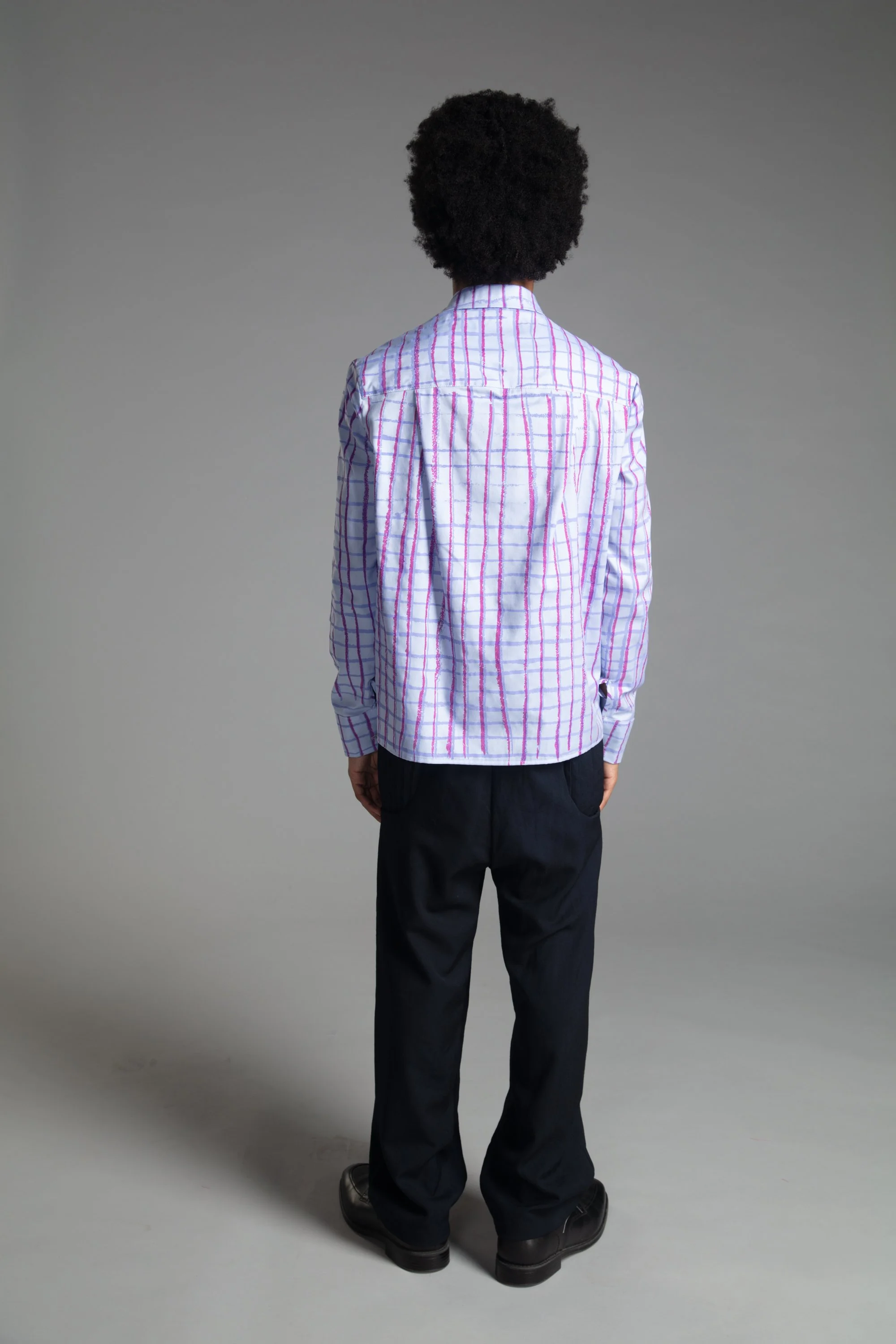 Cotton button-up with hand printed design, pleated wool pants custom dyed, 2026